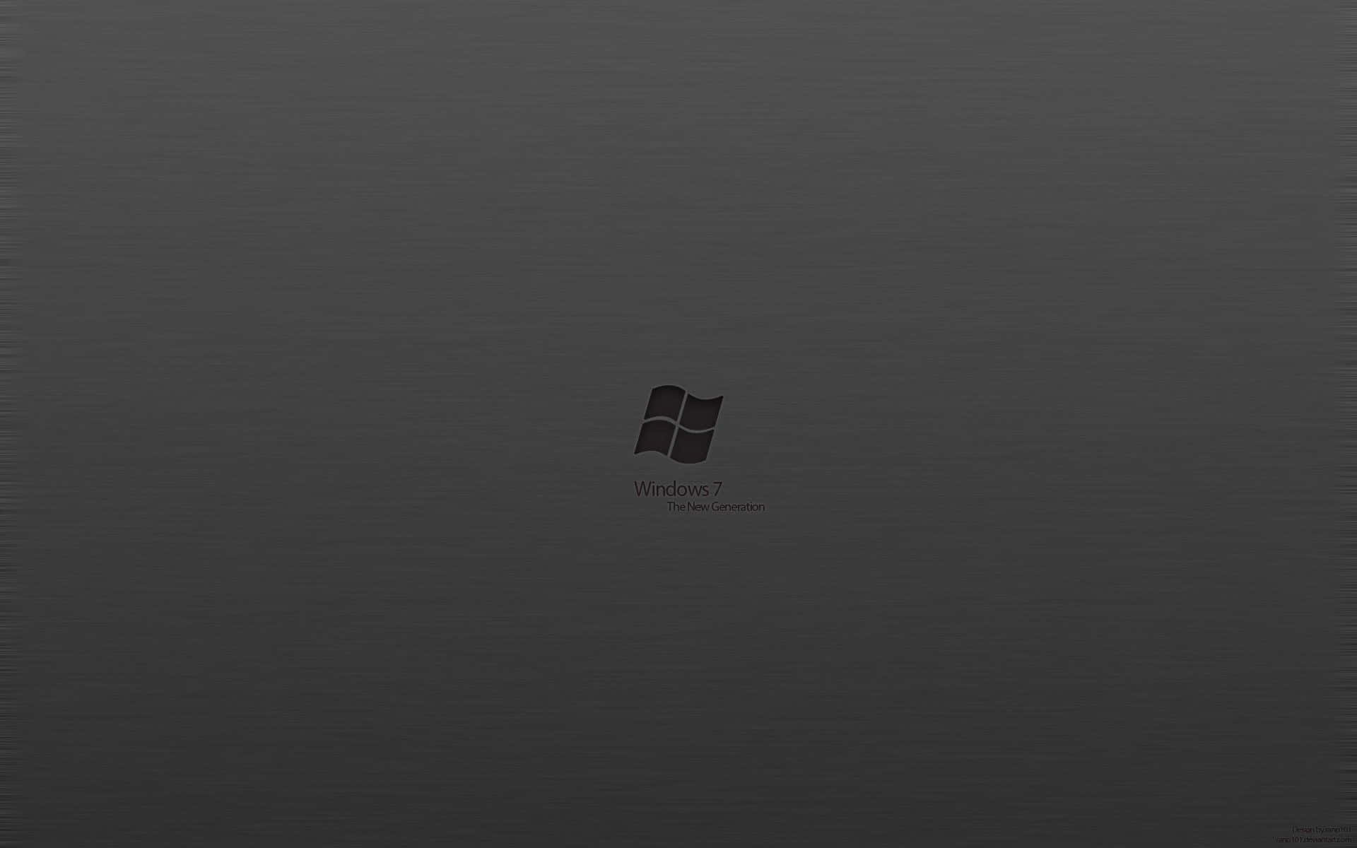 Windows 7 標誌灰底 壁紙 — 一張極簡深灰色桌布，Windows 7 標誌和標語居中顯示在微紋理背景上。