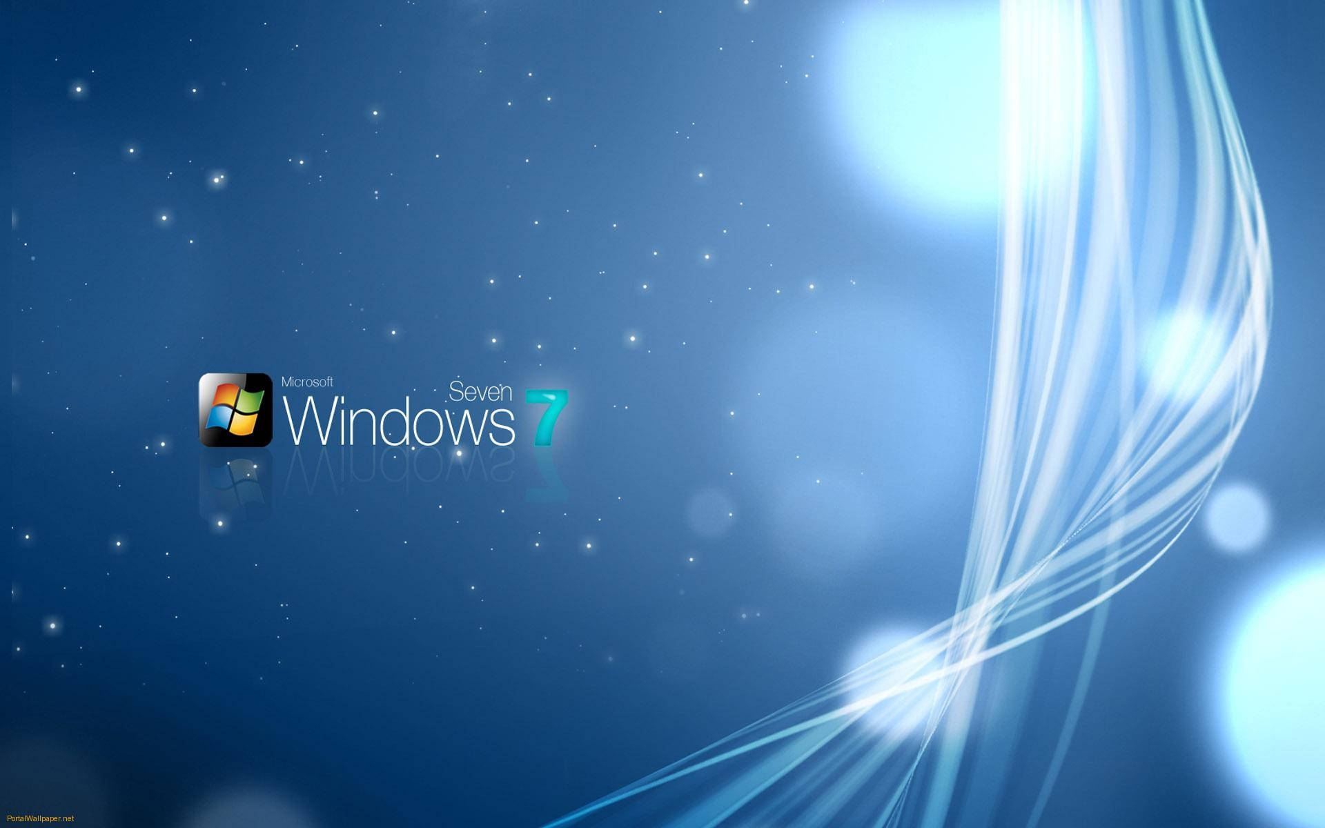 Windows 7 閃耀桌面壁紙 壁紙 — Windows Seven 標誌在深藍色宇宙背景中發光，伴隨著流動的光跡和星狀斑點。