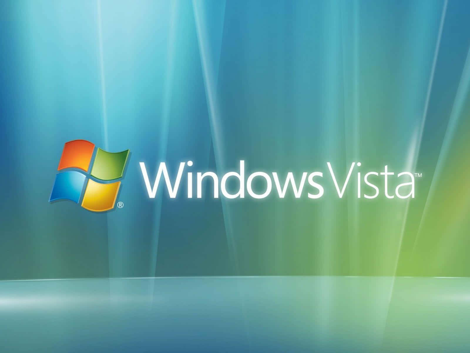 Windows Vista 桌布 壁紙 — Windows Vista 標誌，帶有彩色視窗圖標，背景為藍綠色漸變並帶有光線。