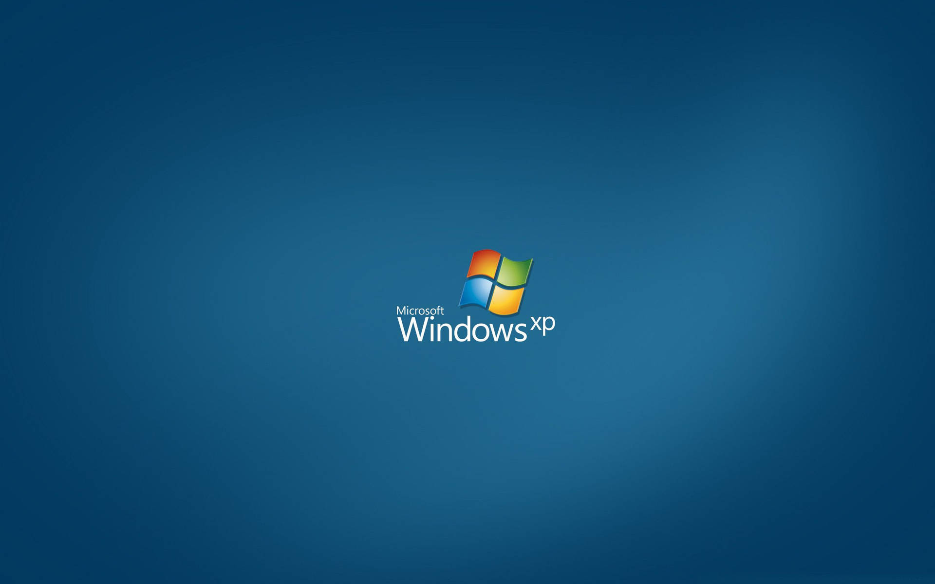 Windows XP 標誌在藍色漸變背景上
