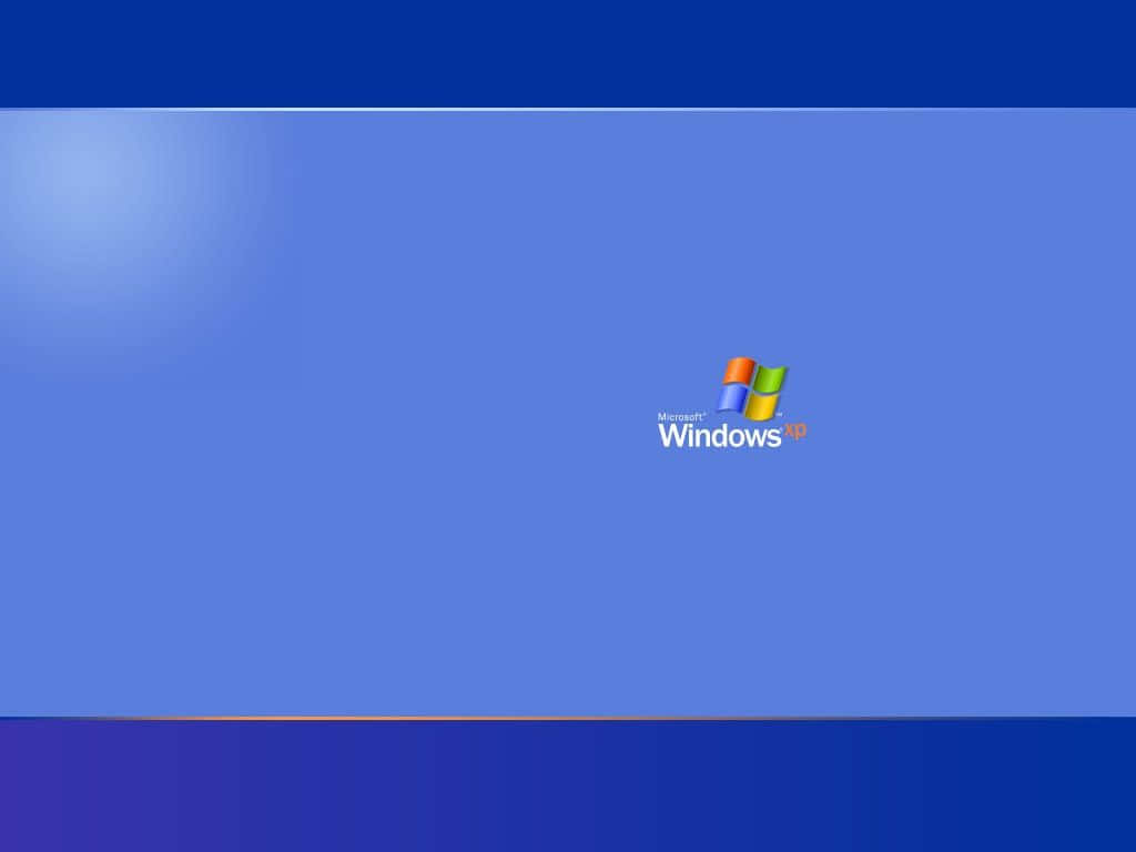 Windows XP 標誌在藍色漸變桌面背景上