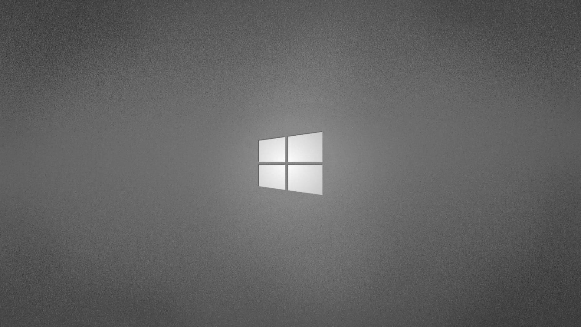 Windows標誌在灰色漸變背景上柔和發光 — 簡約 壁紙