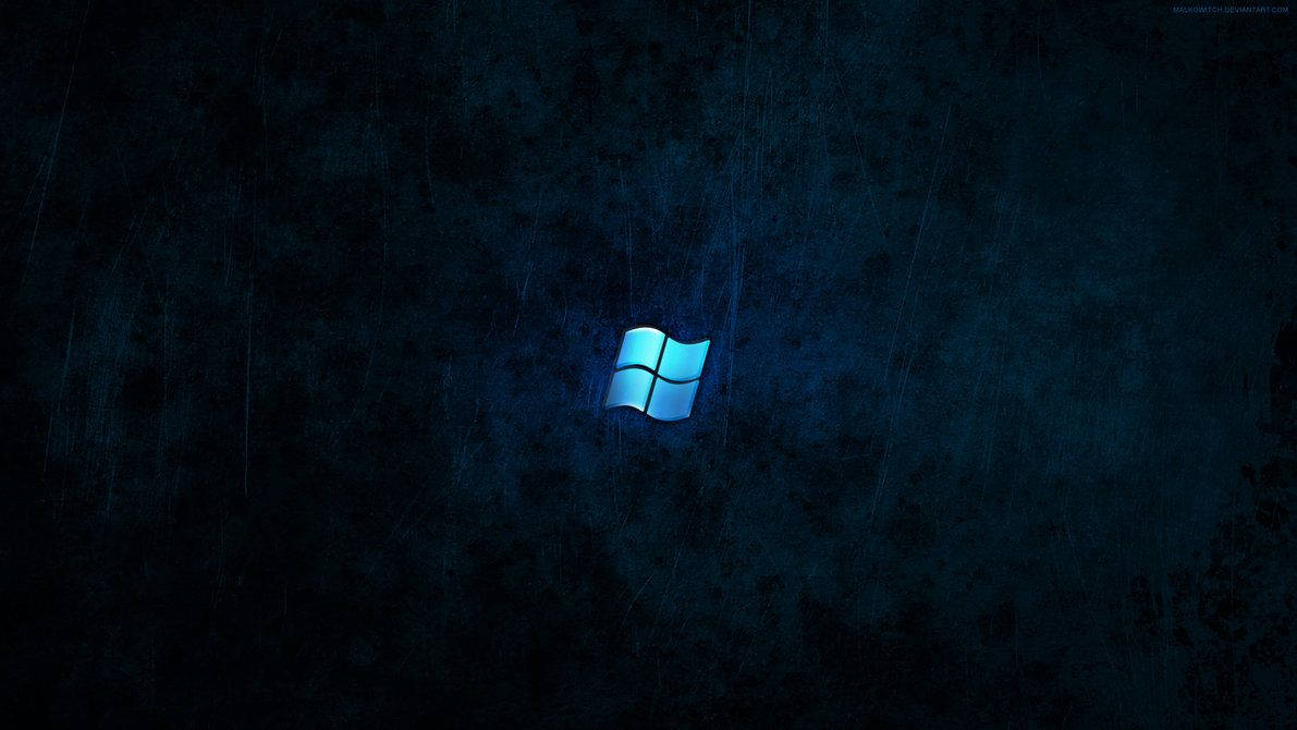 夜雨中發光的Windows標誌，深藍色背景。