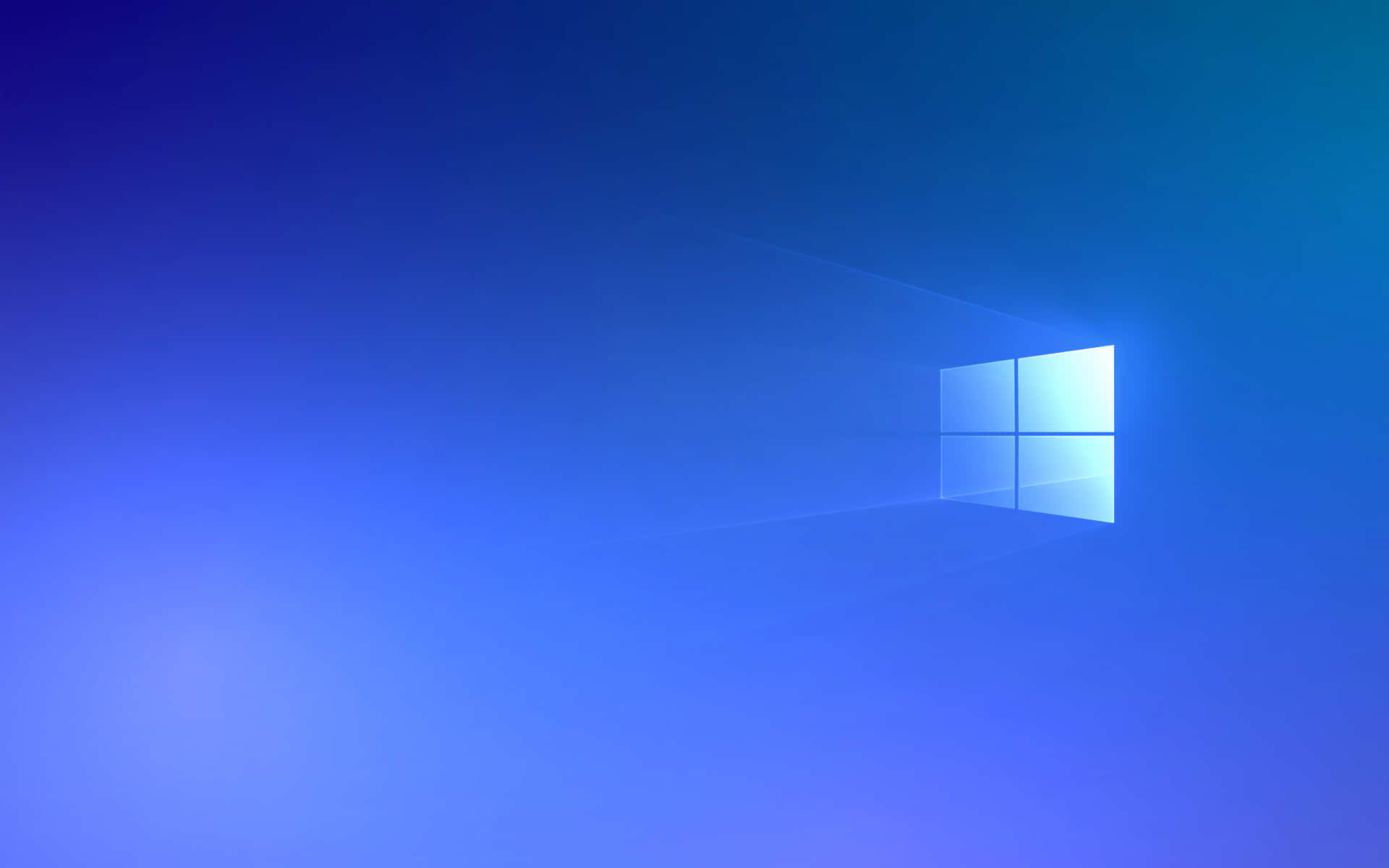 Windows預設背景：寧靜的藍白配色設計 壁紙 — 發光的Windows標誌在極簡數位場景中，將柔和的光線投射到漸變藍色牆壁上。