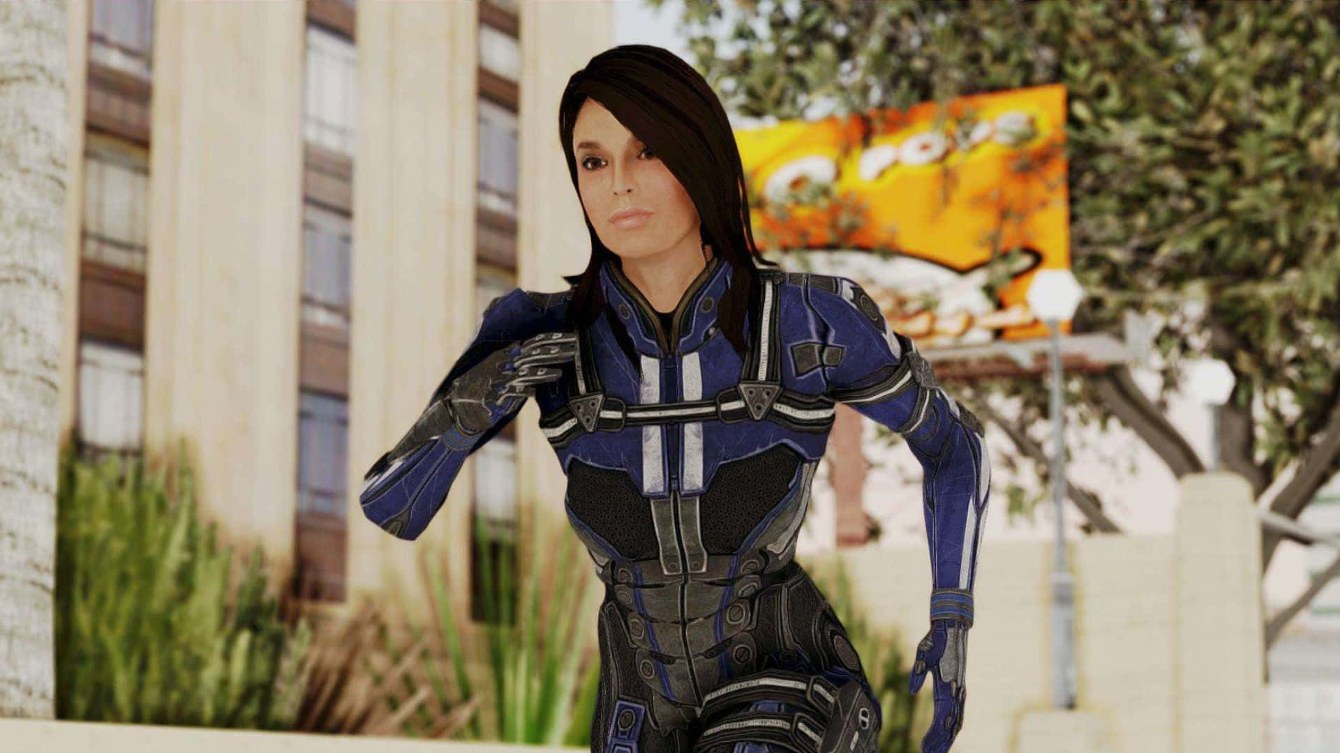 Ashley Williams 桌布 壁紙 — 一位身穿藍黑裝甲服的女性自信地站在城市環境中，背景有棕櫚樹和建築物。