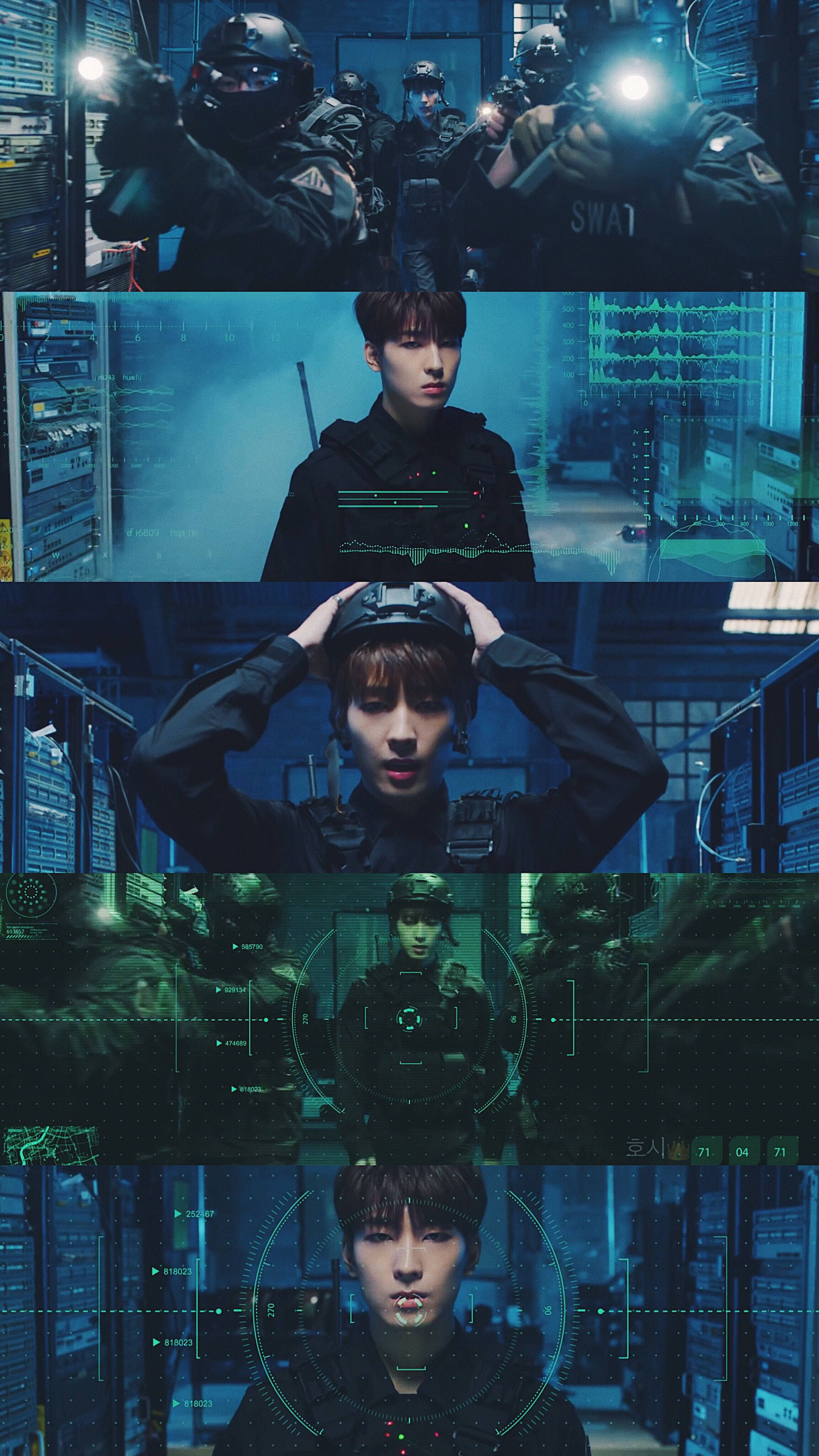 Wonwoo《Happy Ending》MV 壁紙 — 一名身穿戰術裝備的年輕男子被特警隊員包圍在一個高科技伺服器機房，周圍有發光的藍色和綠色數位介面。