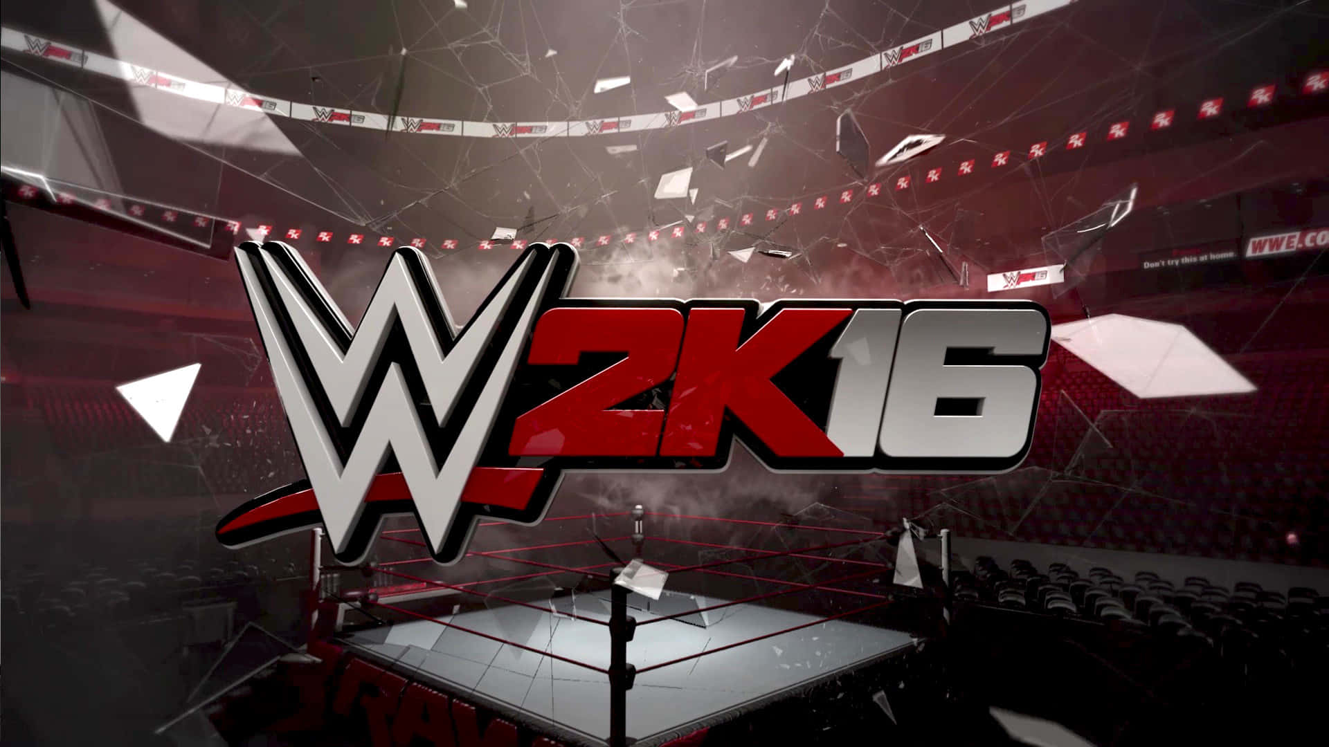 WWE Logo 桌布 壁紙 — WWE 2K16 標誌主宰著一個破碎的競技場，下方有一個摔角擂台和漂浮的碎片，在戲劇性的燈光下。