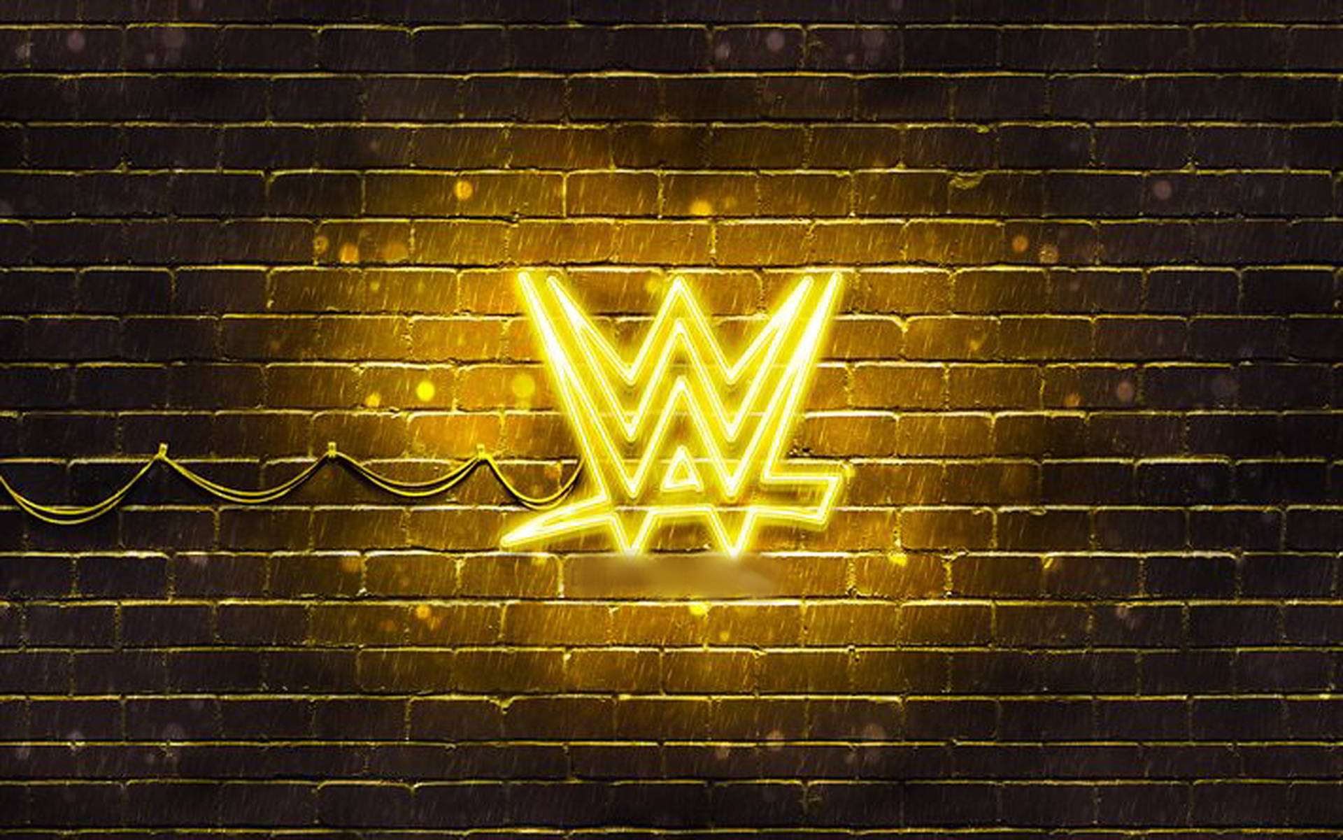 WWE霓虹燈牌在夜晚的濕磚牆上發光。
