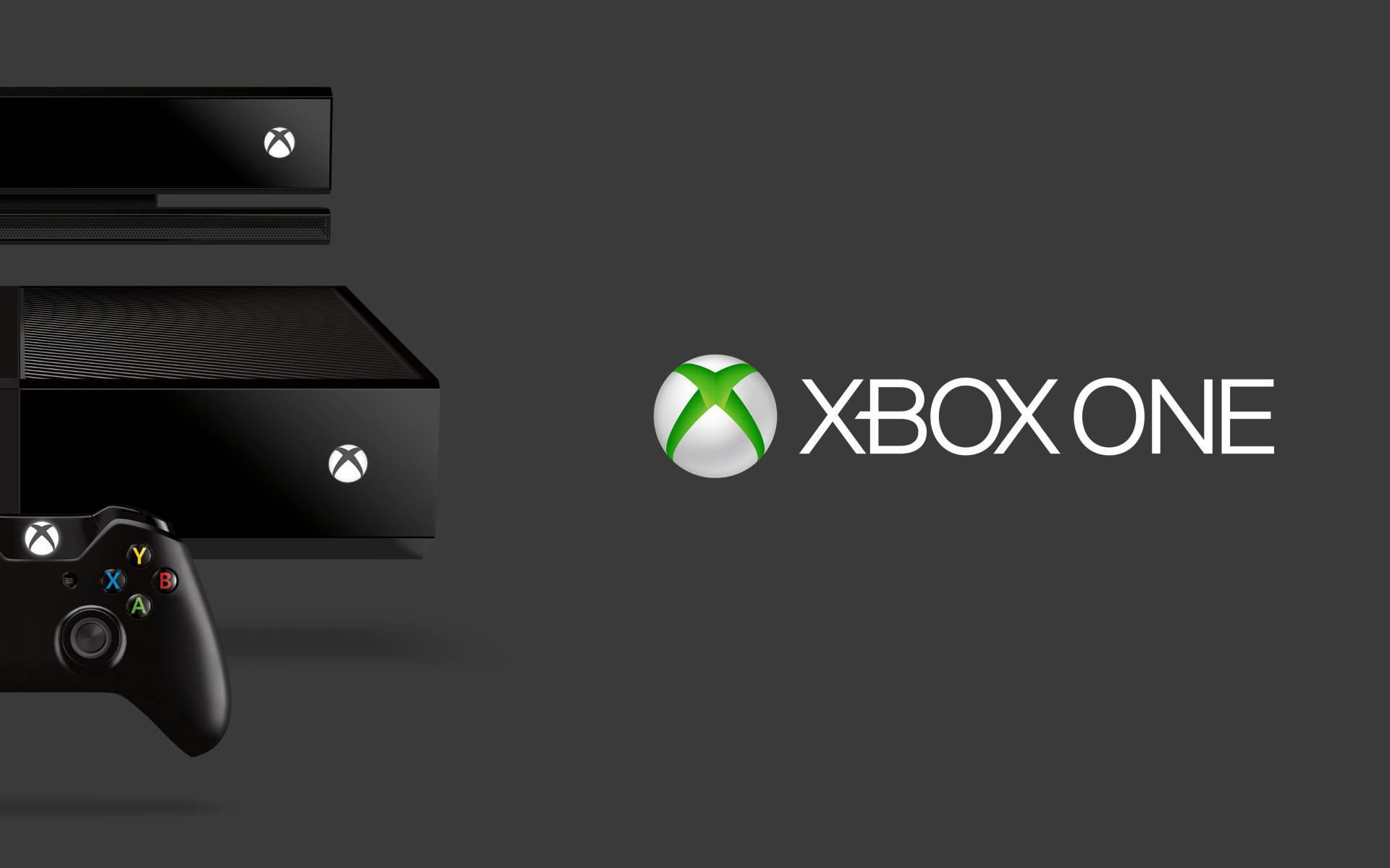 深色背景上帶有標誌的 Xbox One 主機和控制器