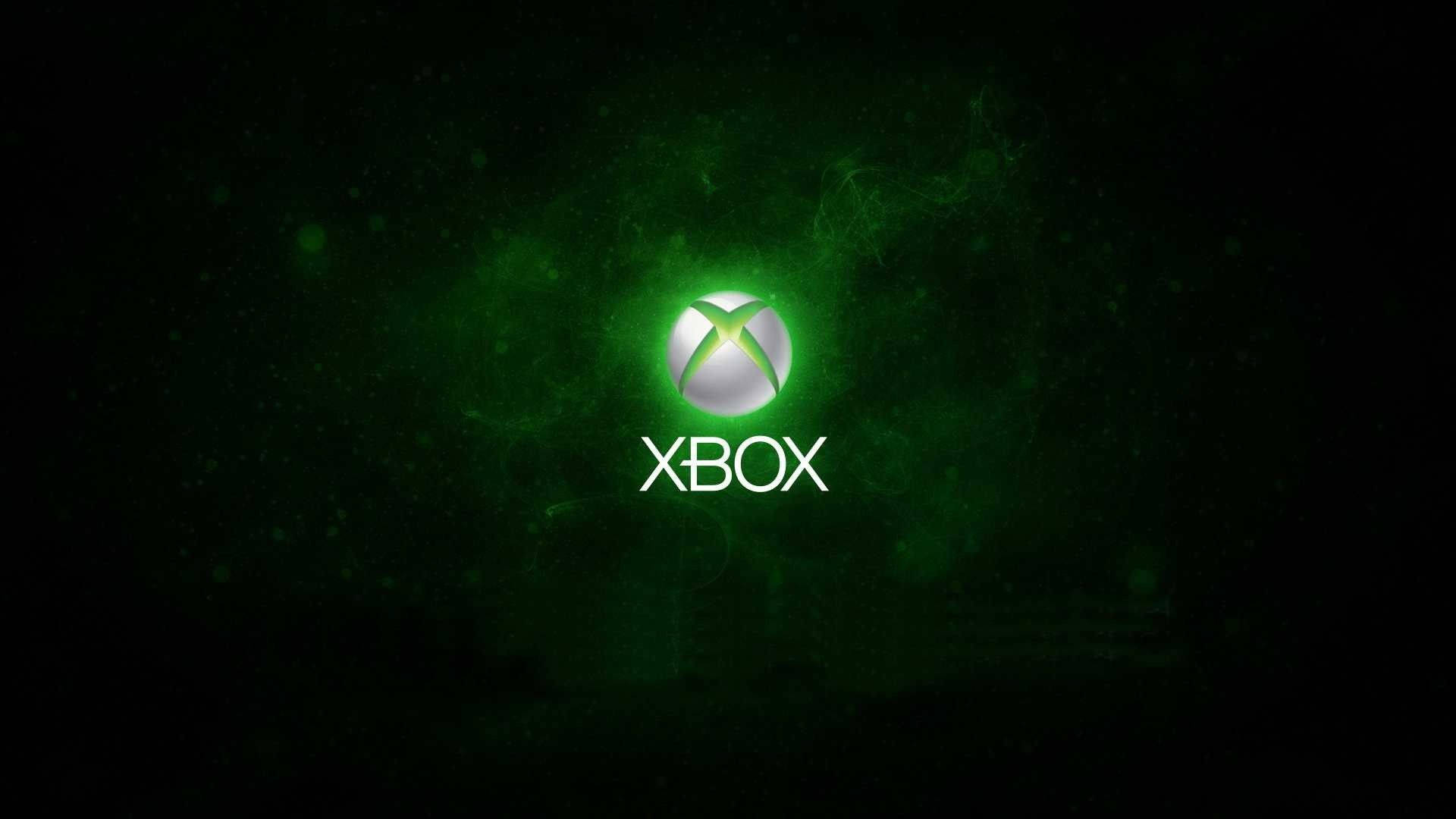 Xbox標誌在黑暗空間中發出綠色光芒，帶有漂浮粒子