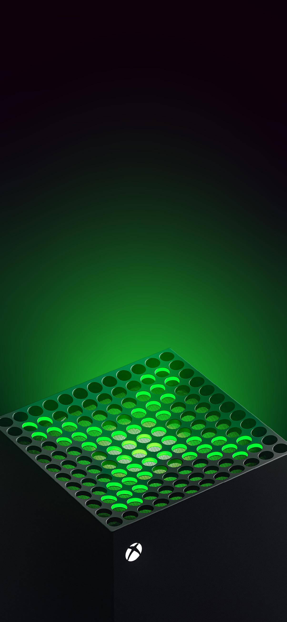 Xbox Series X 綠色燈光 壁紙 — 一部黑色Xbox主機在深色漸變背景上，從其穿孔頂板發出鮮豔的綠光。