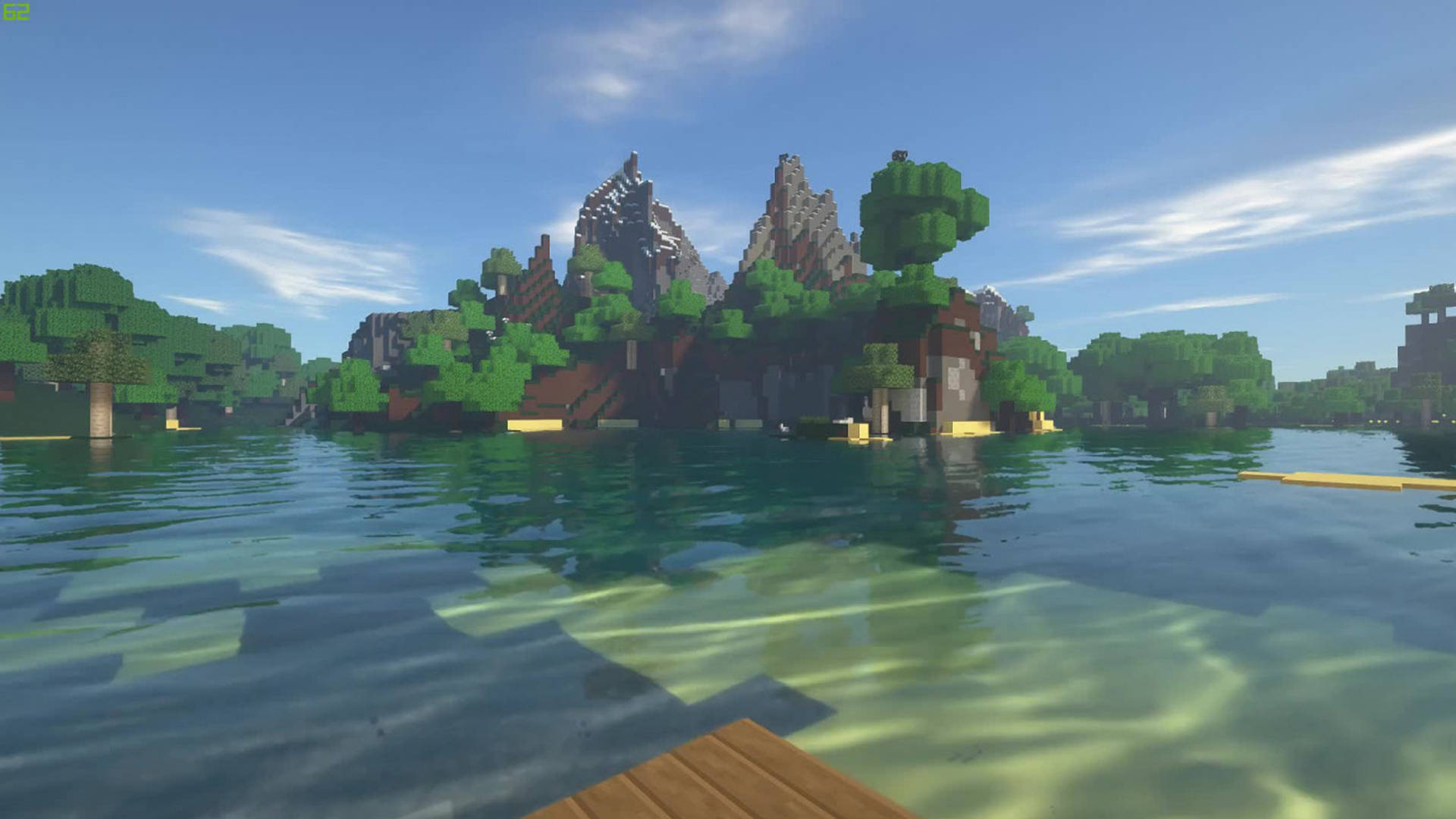 像素化的Minecraft島嶼，有樹木和山脈，在藍天下清澈的水中。