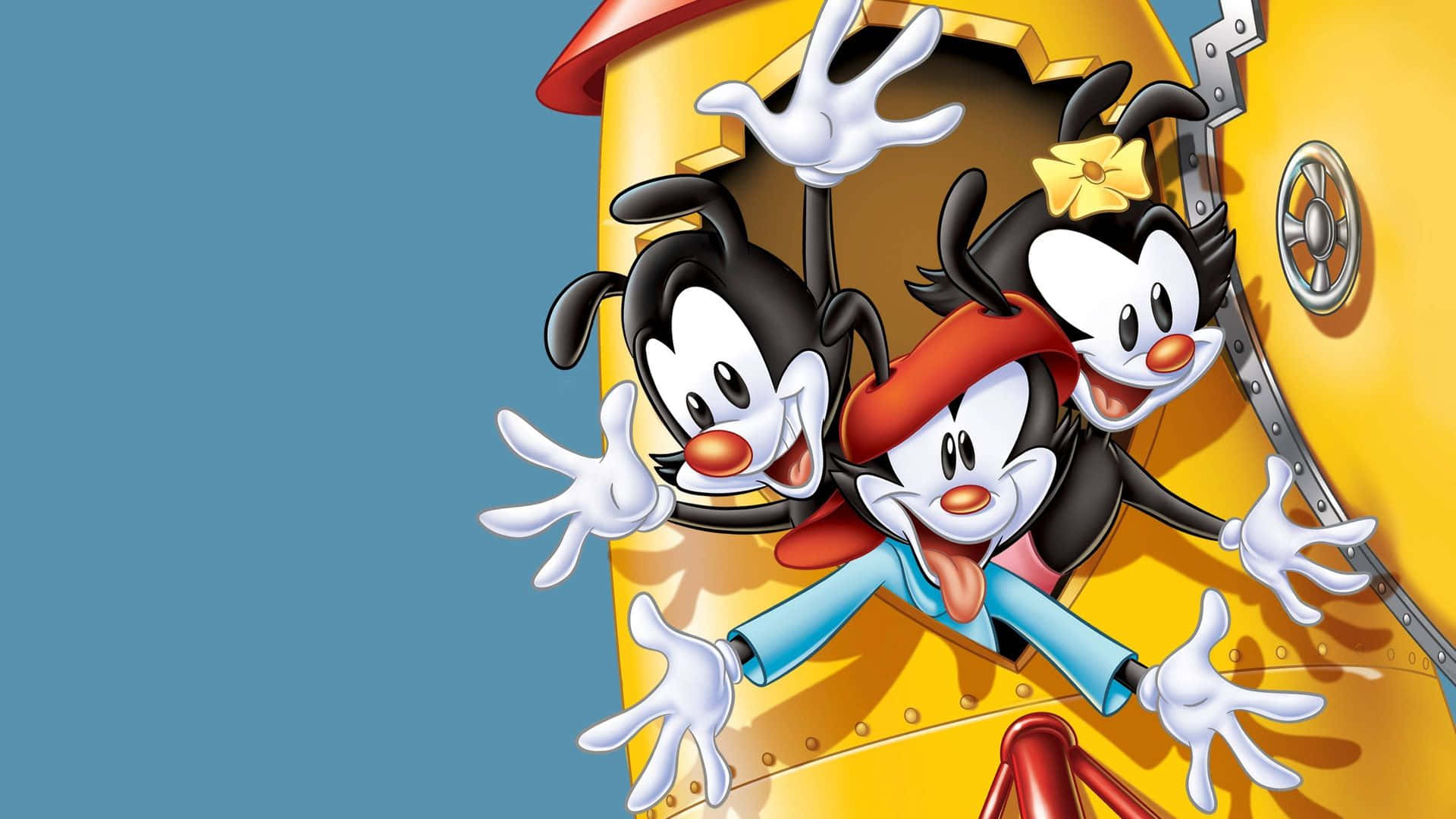 Yakko、Wakko 與 Dot 在 Animaniacs 中瘋狂冒險 壁紙 — 三個卡通人物從一艘黃色太空船中愉快地探出頭來，背景是純藍色。