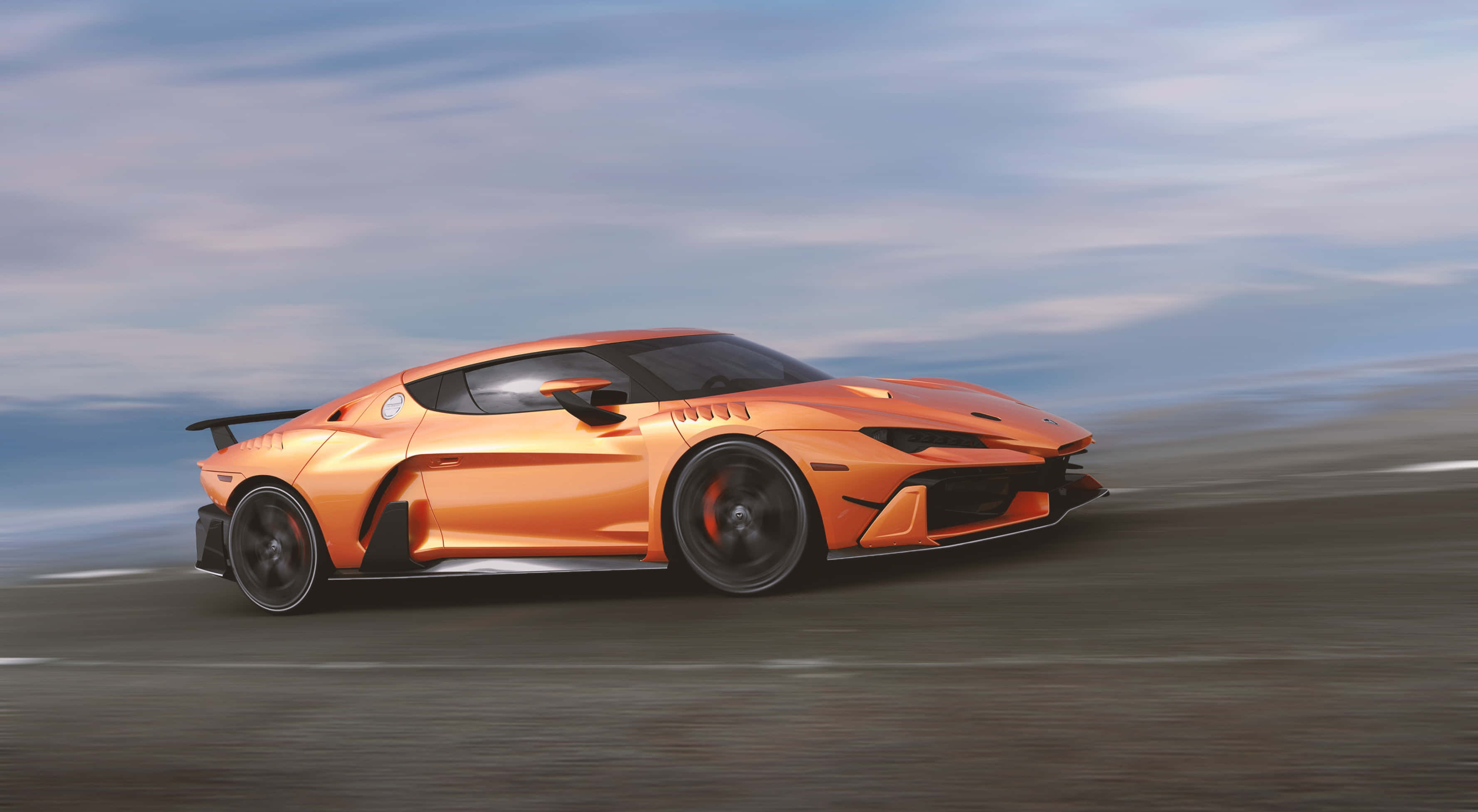 Fantasy Cars 桌布 壁紙 — 一輛充滿活力的橙色跑車在模糊的沙漠公路上飛馳，天空是柔和的藍色。
