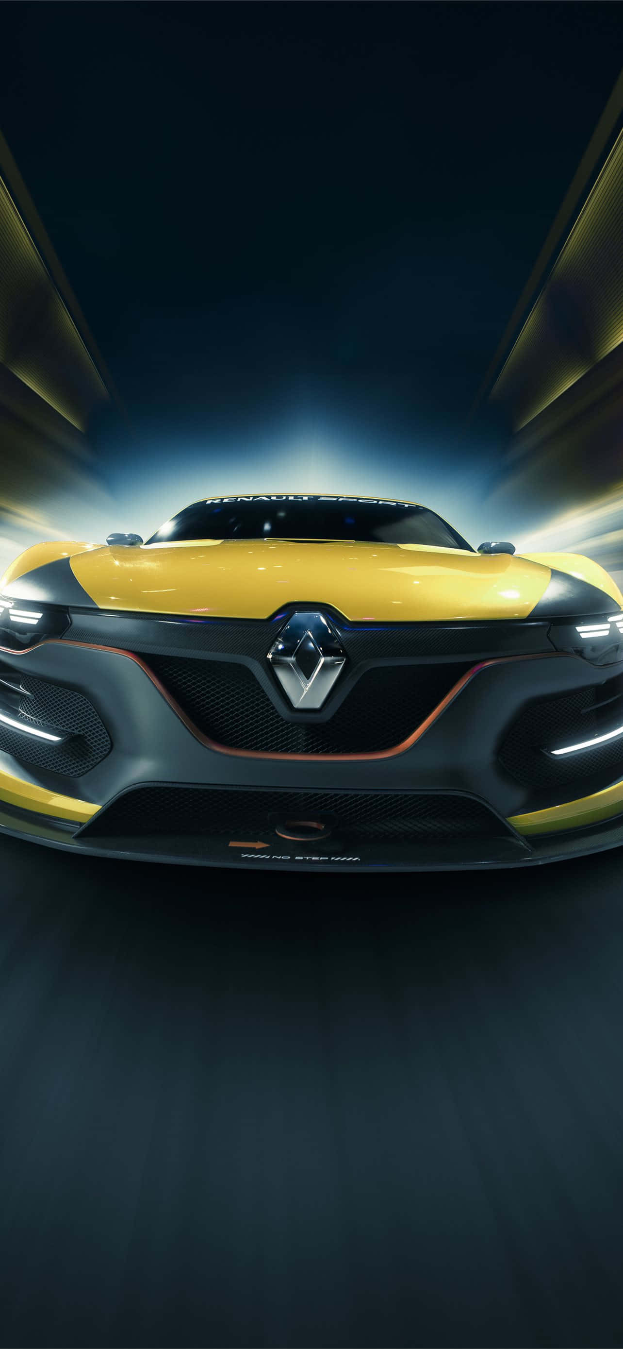 Renault Scenic 桌布 壁紙 — 一輛黃色雷諾跑車在黑暗隧道背景下，帶著發光的車頭燈和動態模糊條紋向前疾馳。