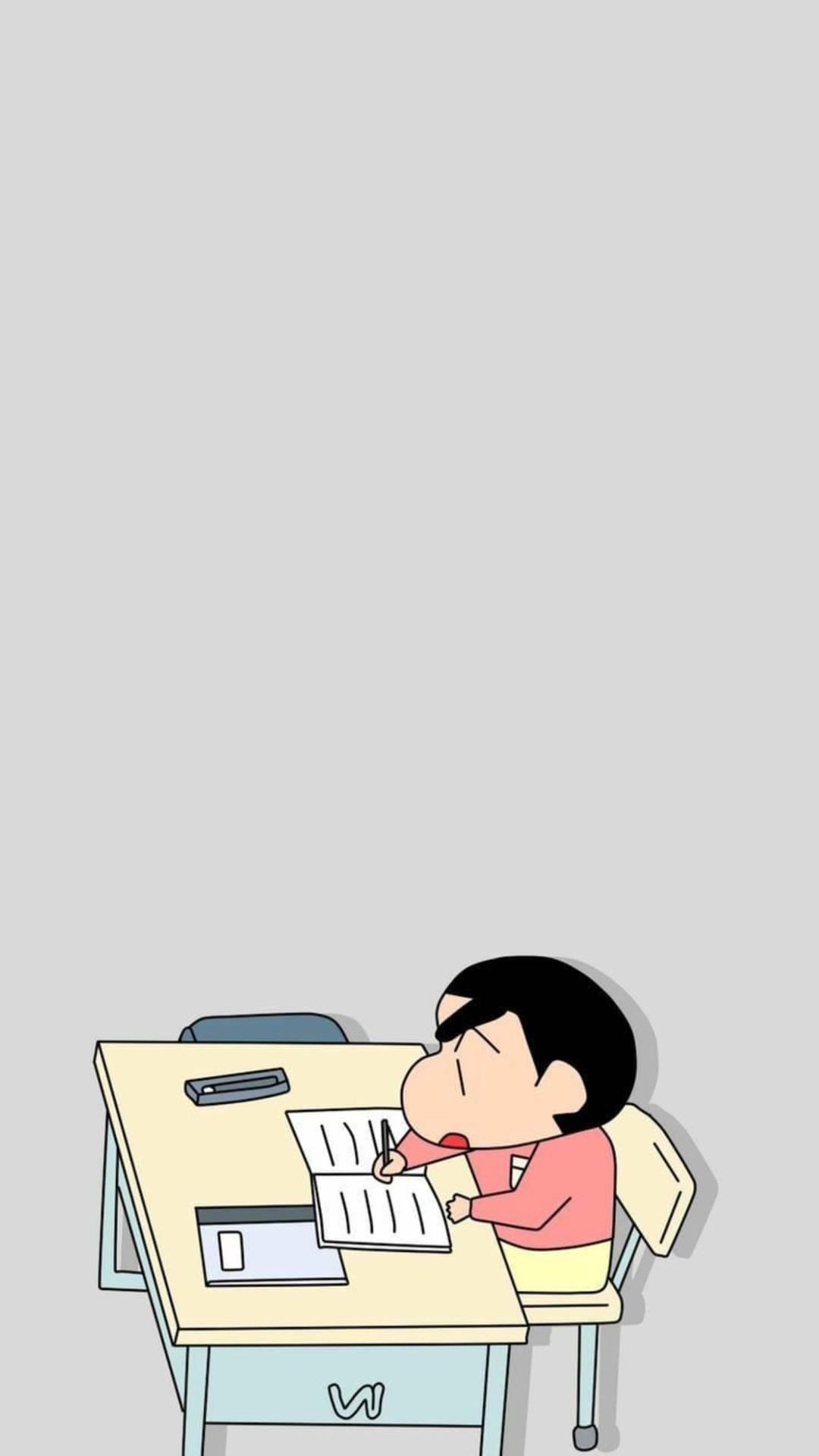 卡通男孩在桌子上用筆寫字時睡著了
