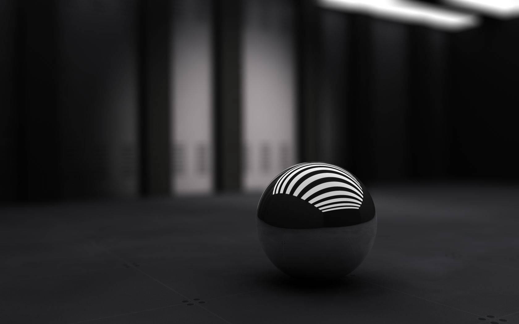 似夢捕手的3D黑白球體 壁紙 — 一個帶有白色同心條紋的光滑黑色球體，放置在燈光昏暗的伺服器機房中，背景是模糊的機架。