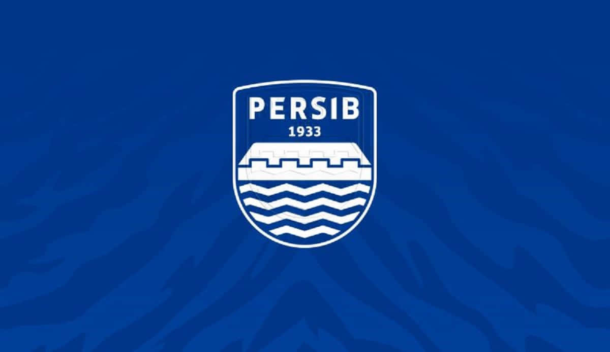  壁紙 — 一個帶有城堡和波浪的白色Persib 1933標誌，居中放置在帶有紋理的皇家藍色背景上。