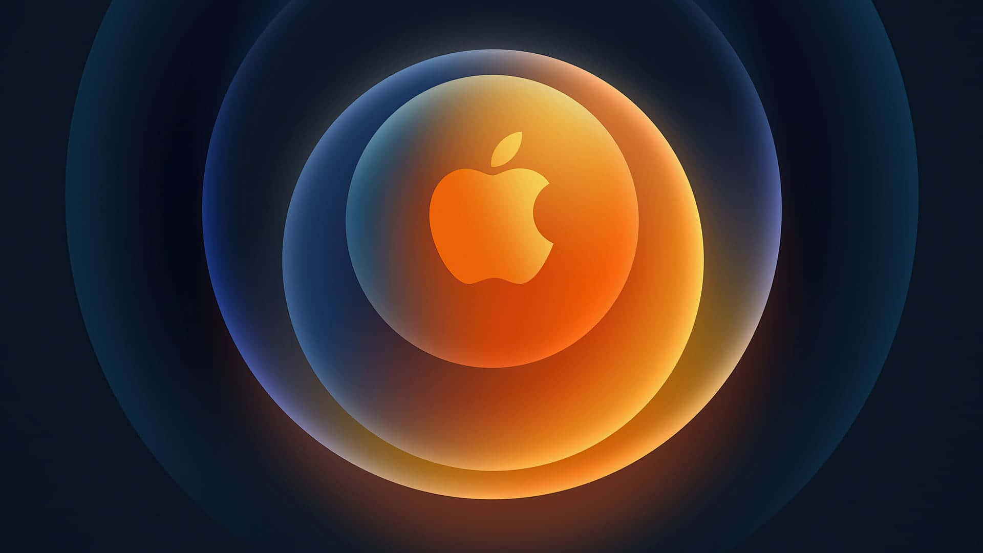發光的橙色Apple標誌，被藍色和橙色圓環包圍，背景為深色