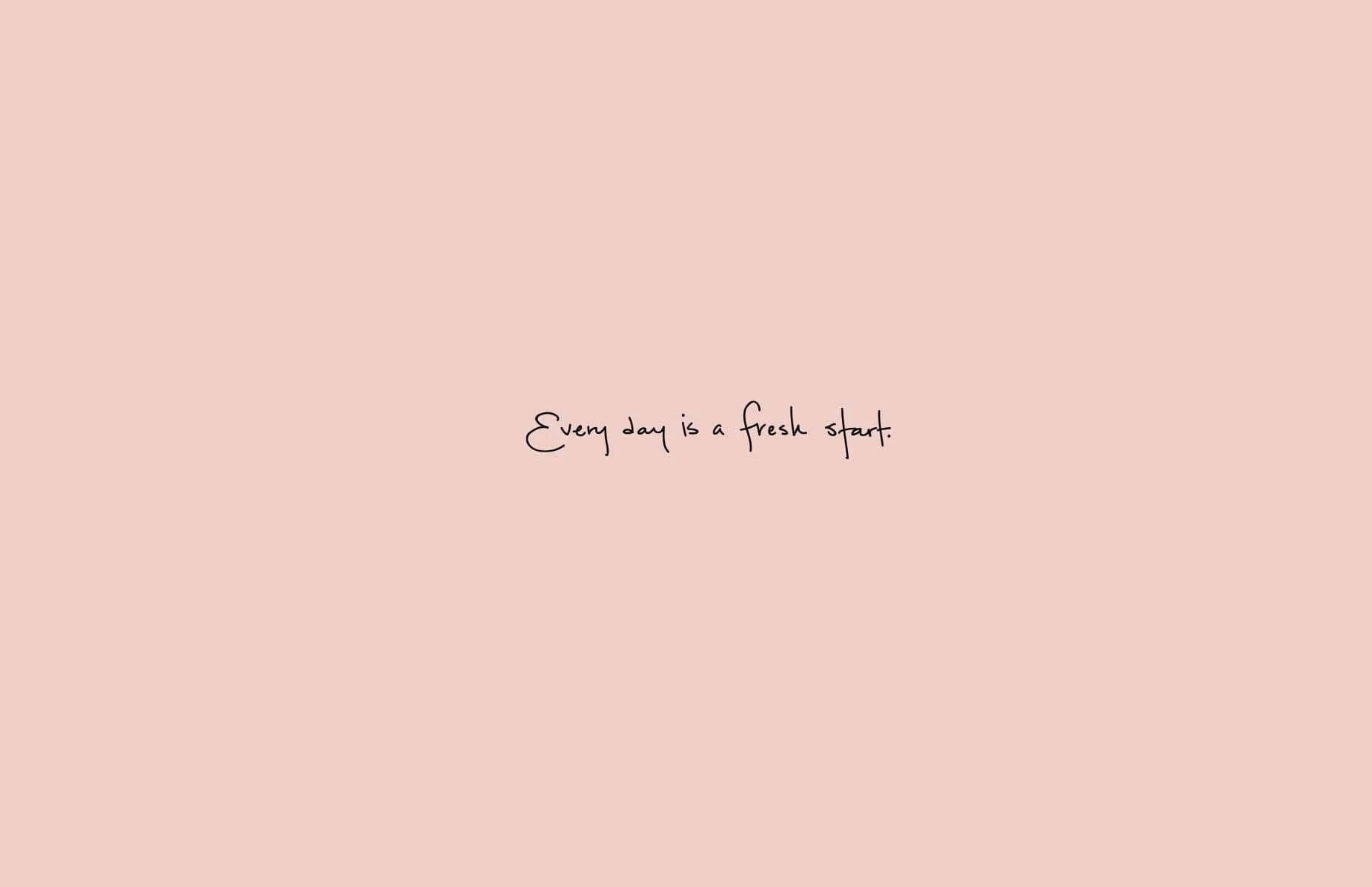  壁紙 — 一個簡約的桃色背景，中央以黑色手寫字體呈現「Every day is a fresh start」這句話。
