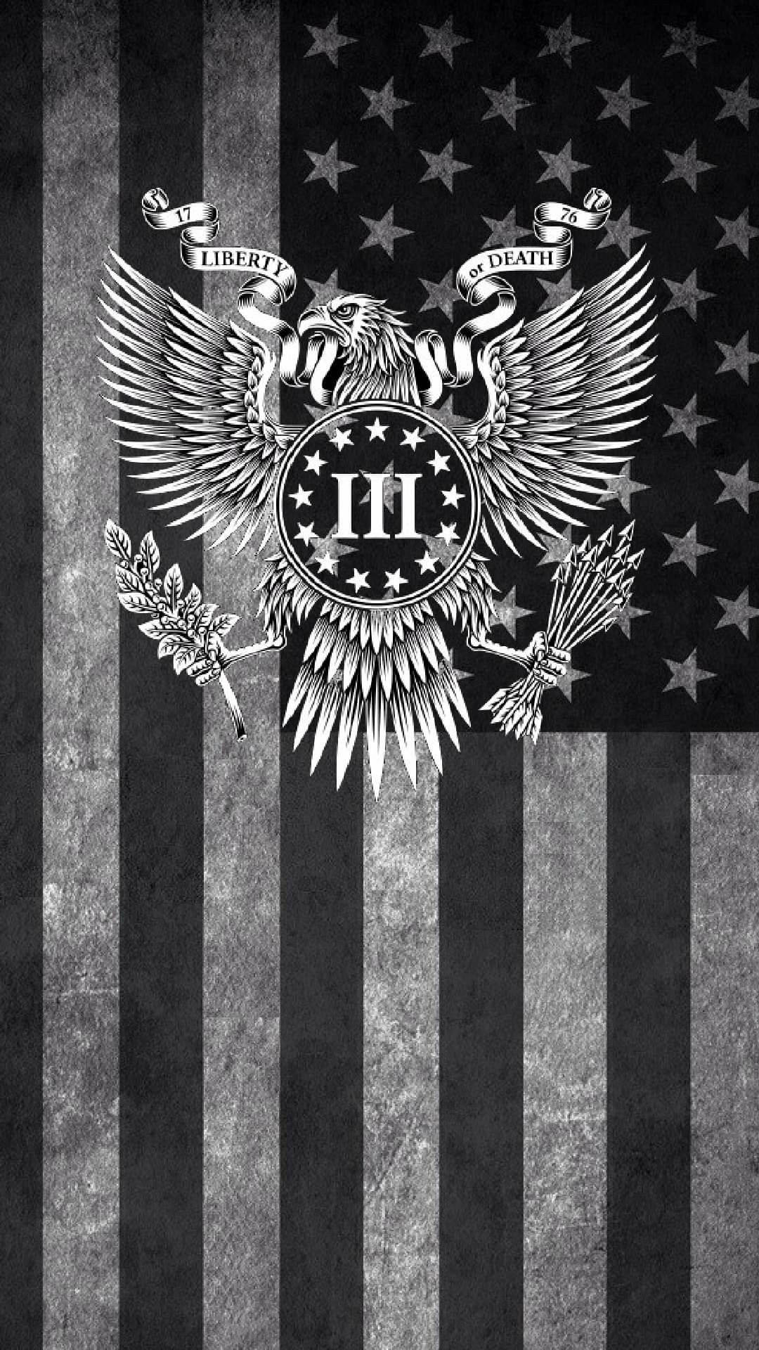 鷹徽，帶有「Liberty or Death」橫幅，置於破舊的美國國旗上。