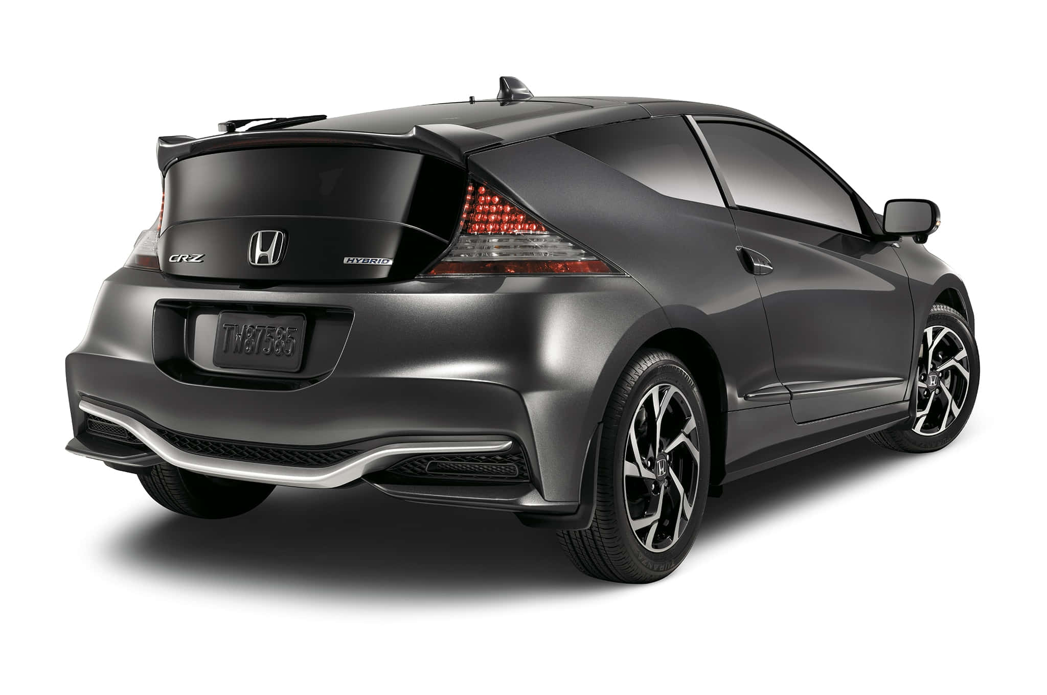 Honda Cr-z 桌布 壁紙 — 一輛流線型磨砂灰色本田CR-Z雙門跑車，從後方四分之三角度拍攝，背景為純白色。