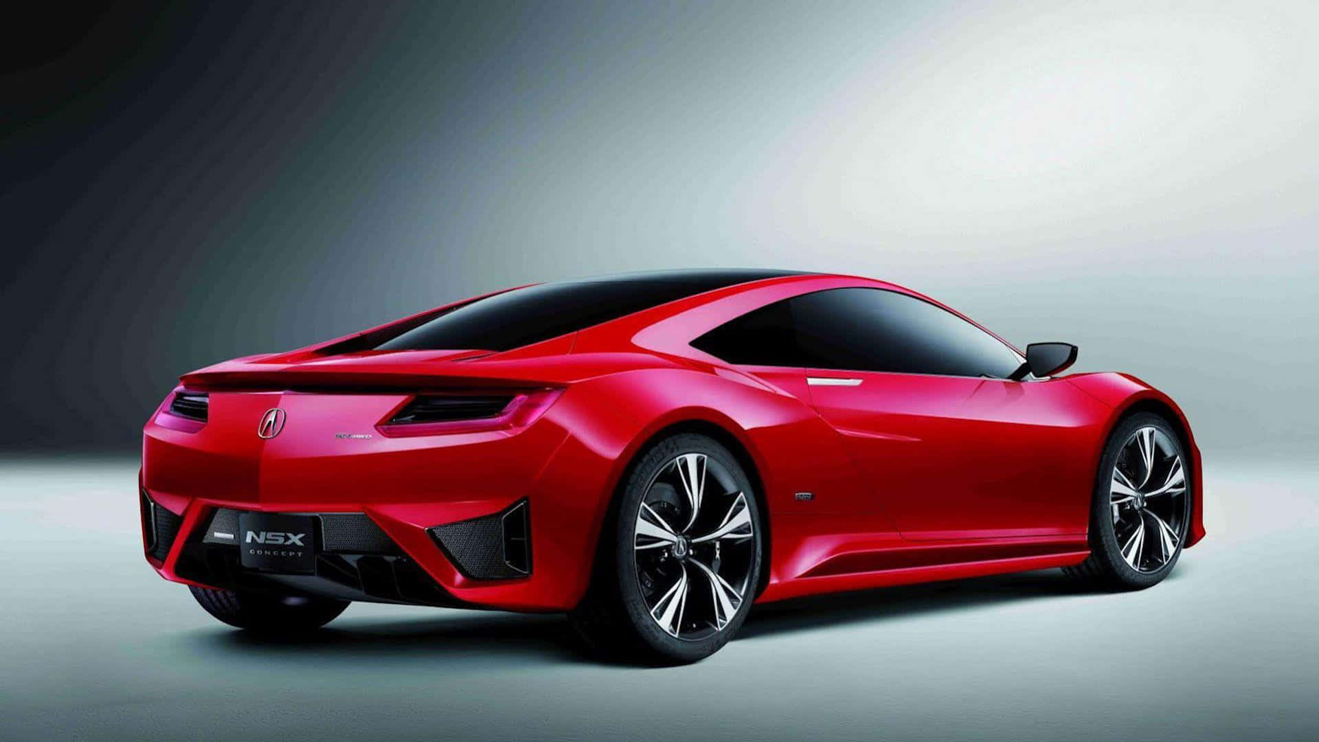 Acura Nsx 桌布 壁紙 — 一輛時尚的紅色Acura NSX跑車，帶有黑色飾件和銀色輪圈，在工作室環境中展示，配有漸變燈光。