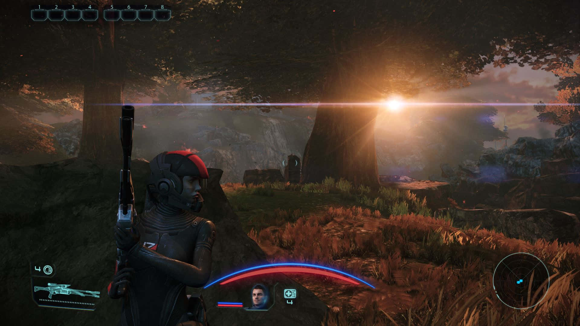 Mass Effect Legendary Edition 桌布 壁紙 — 一名身穿暗色盔甲的未来士兵在黃昏時分的陽光森林中站立，手持帶有發光HUD元素的步槍。