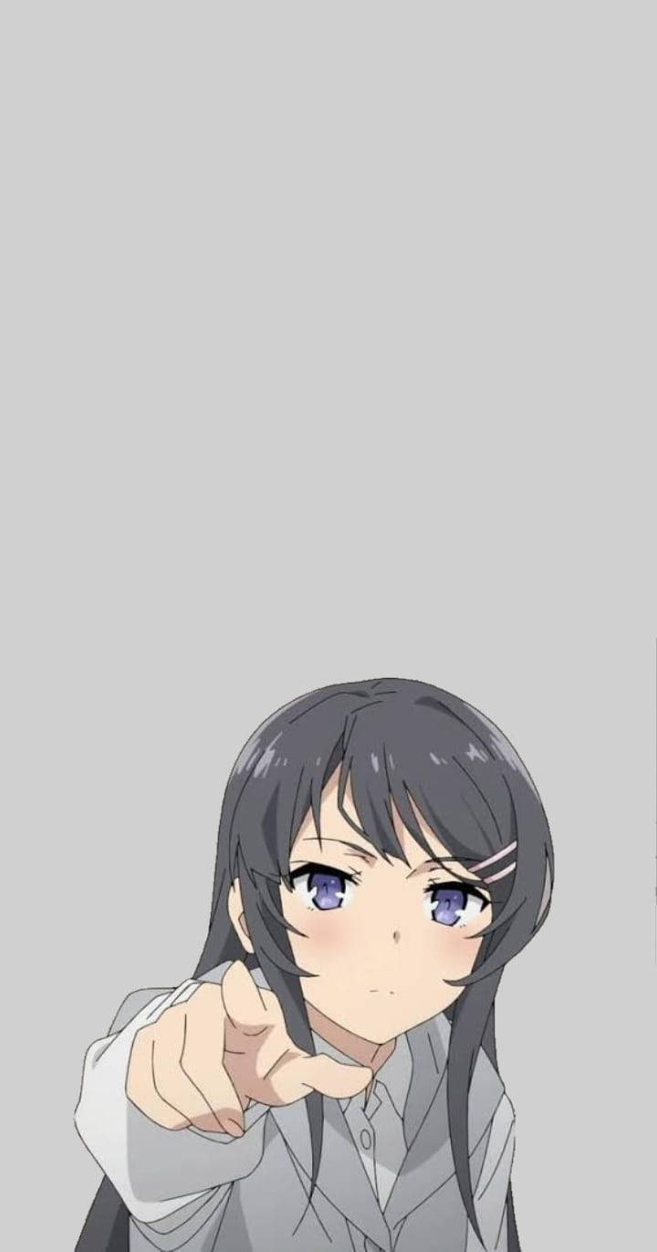 黑髮紫眼的動漫女孩在灰色背景上指向觀眾