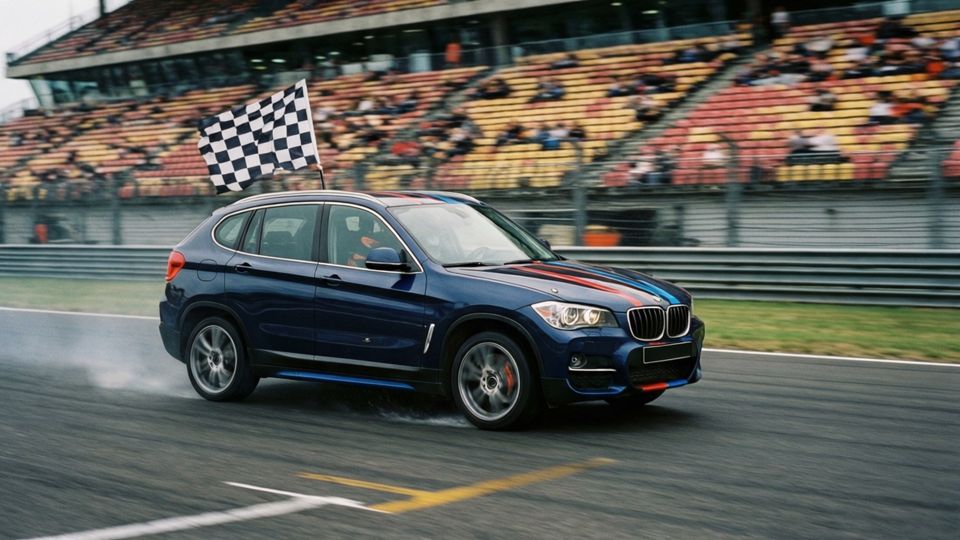 藍色BMW X3 SUV在賽車場上衝過終點線，帶有格子旗。
