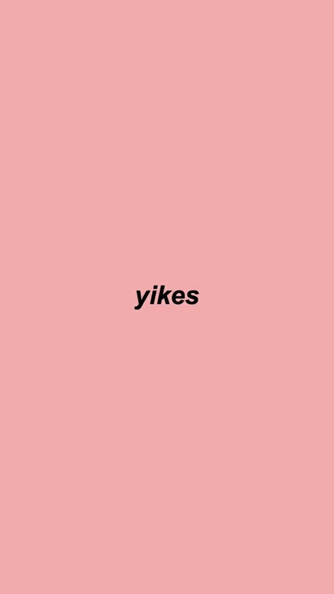 純色粉紅色背景上顯示粗體黑色文字 yikes。