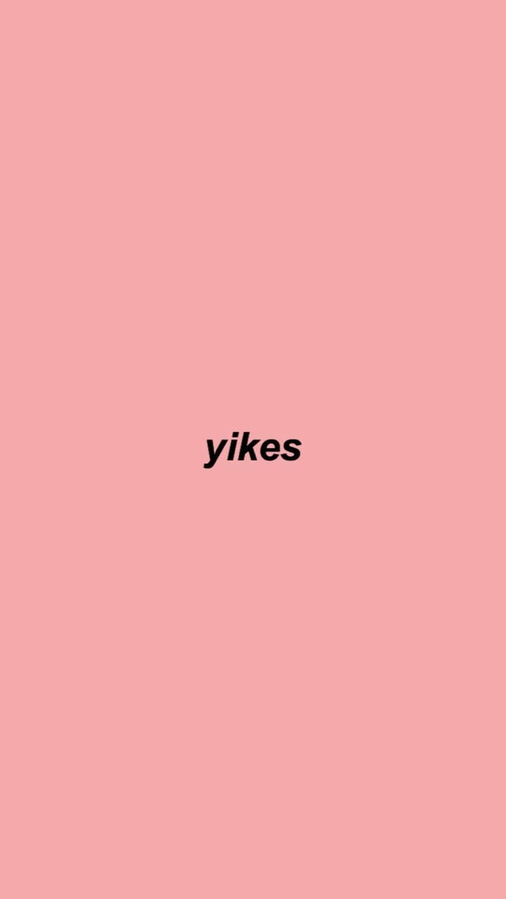 純色粉紅色背景上顯示粗體黑色文字 yikes。