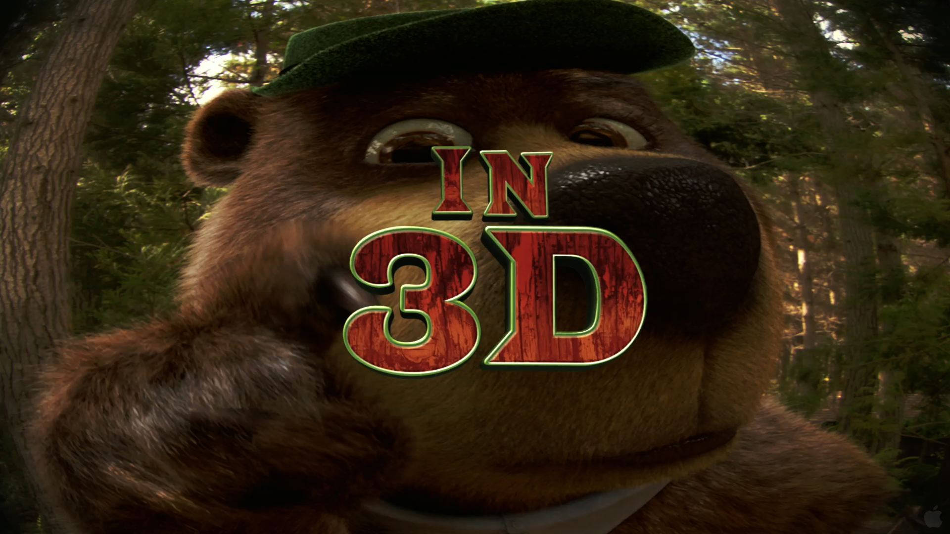 Yogi Bear 3D 特寫 壁紙 — 一隻友善的動畫熊戴著綠色帽子，上面覆蓋著紅色木紋質感的 'IN 3D' 文字特寫。