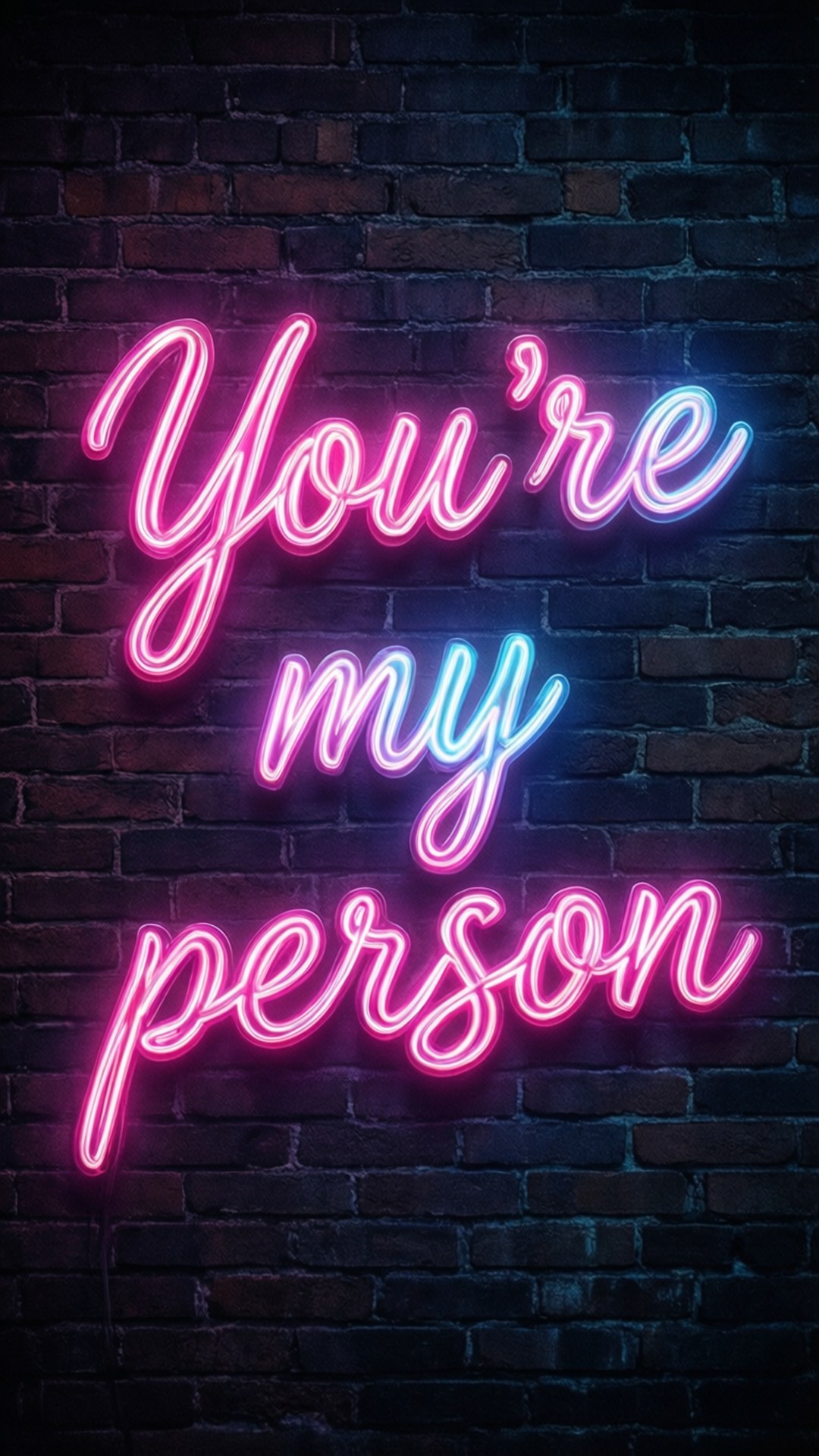 夜晚磚牆上寫著「You're my person」的霓虹燈牌