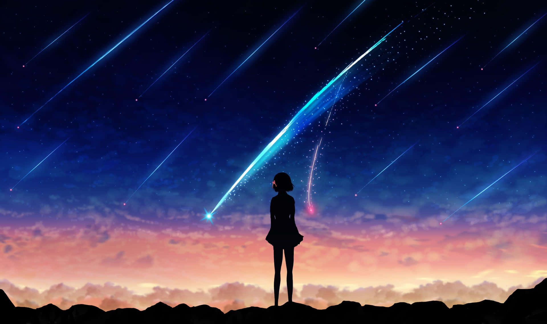 女孩看著發光的流星劃過暮色天空