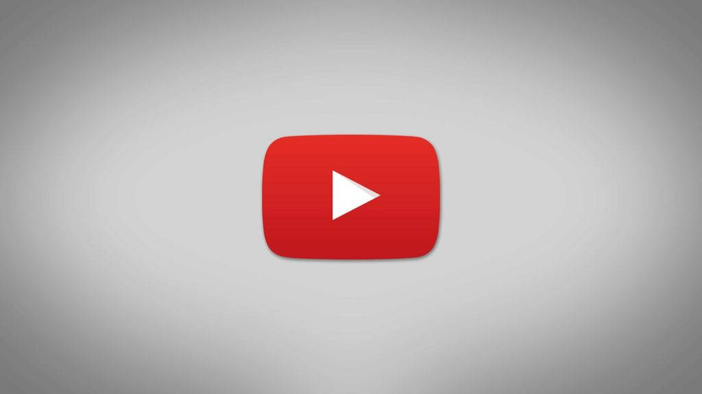 灰色漸變背景上的 YouTube 播放按鈕標誌