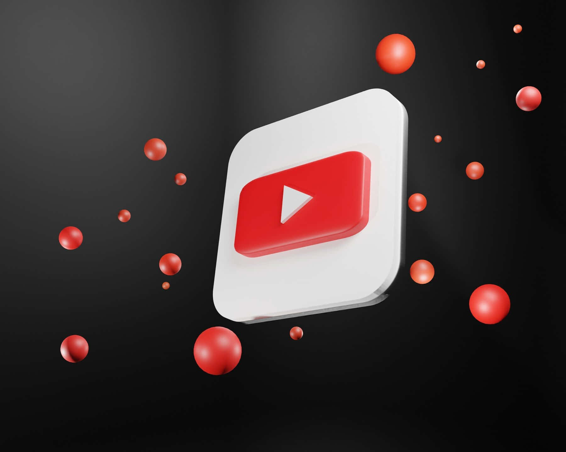 YouTube 標誌配紅色球體飛舞環繞 壁紙