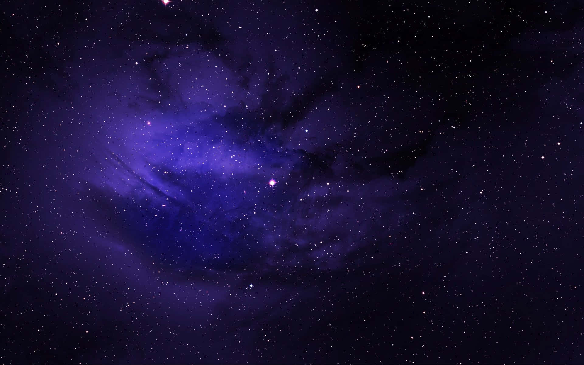 夜空中充滿星星的紫色星雲。