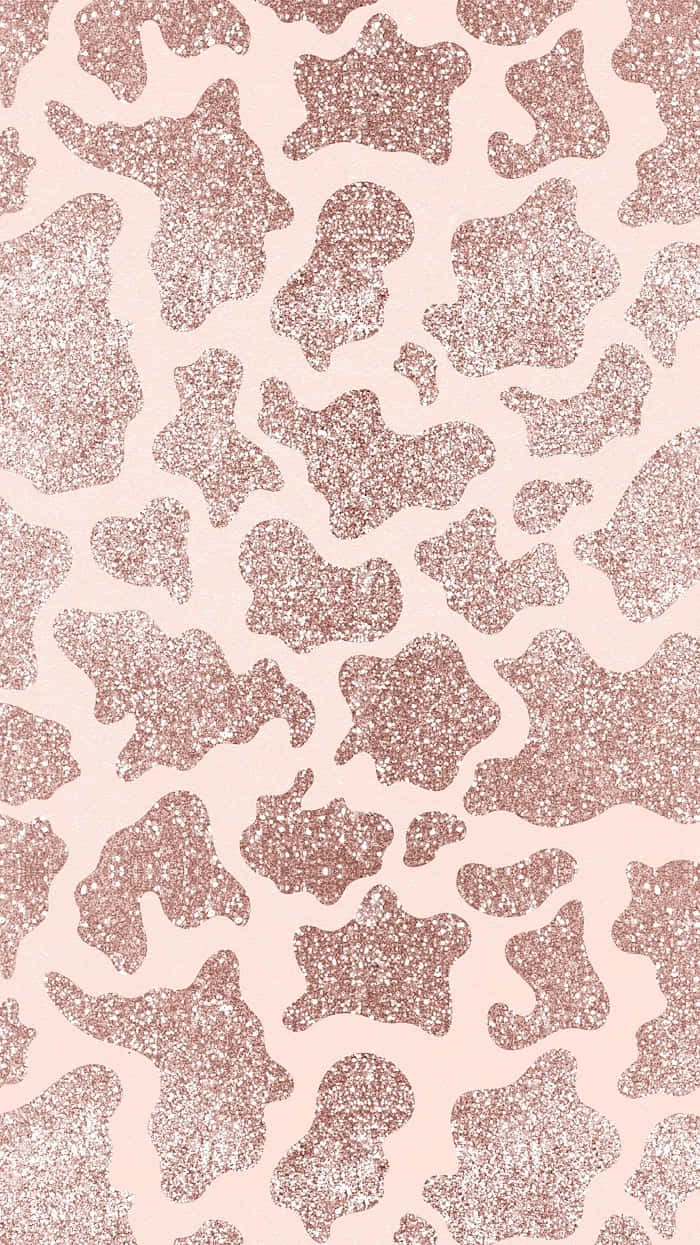Cheetah Print Aesthetic 桌布 壁紙 — 在柔和的胭脂色背景上，帶有閃爍質感的玫瑰金閃粉豹紋圖案。
