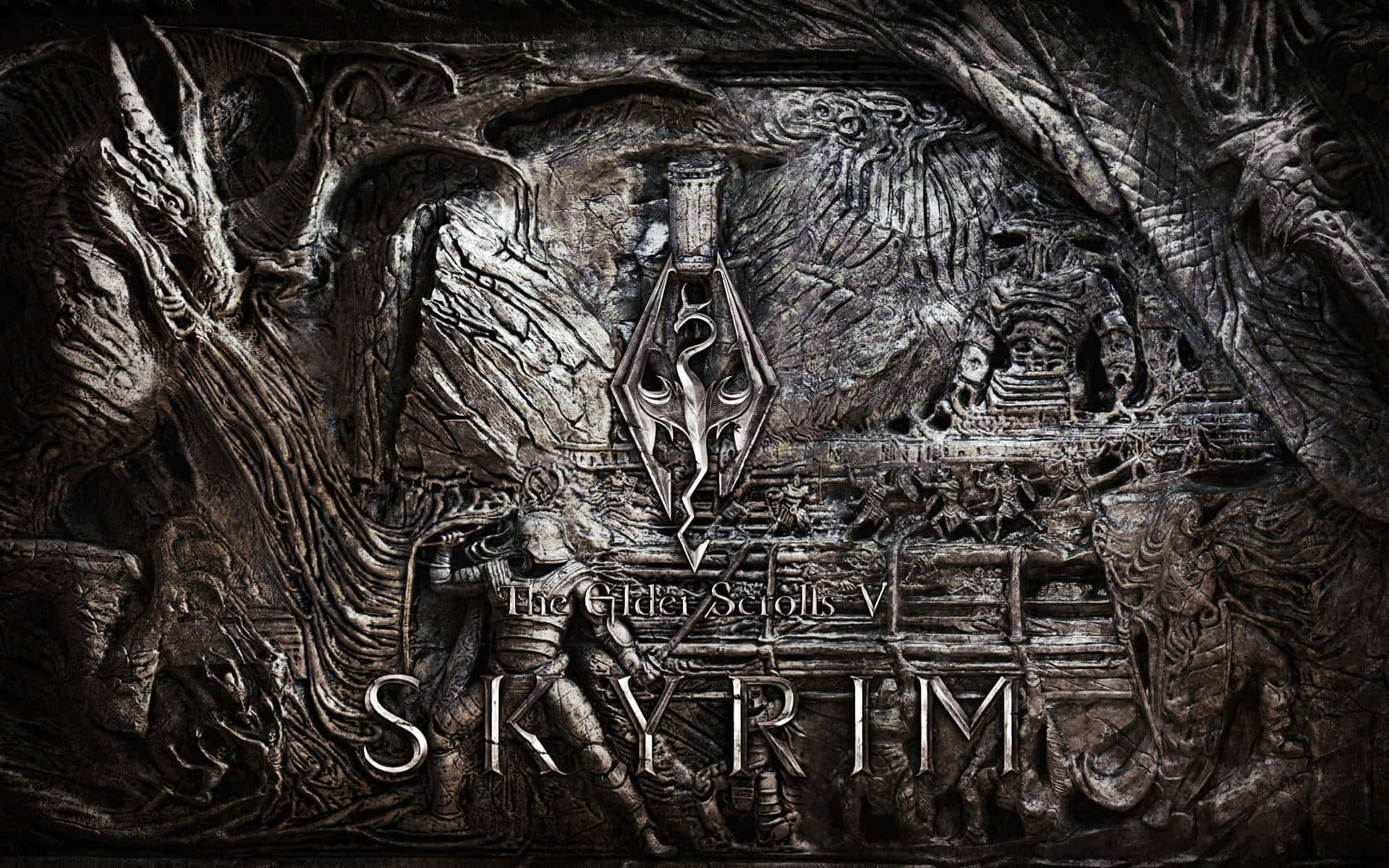 Skyrim Dragonborn 桌布 壁紙 — 一件深色金屬浮雕藝術品，以精細雕刻呈現《Skyrim》標誌性的龍與戰士圖案。