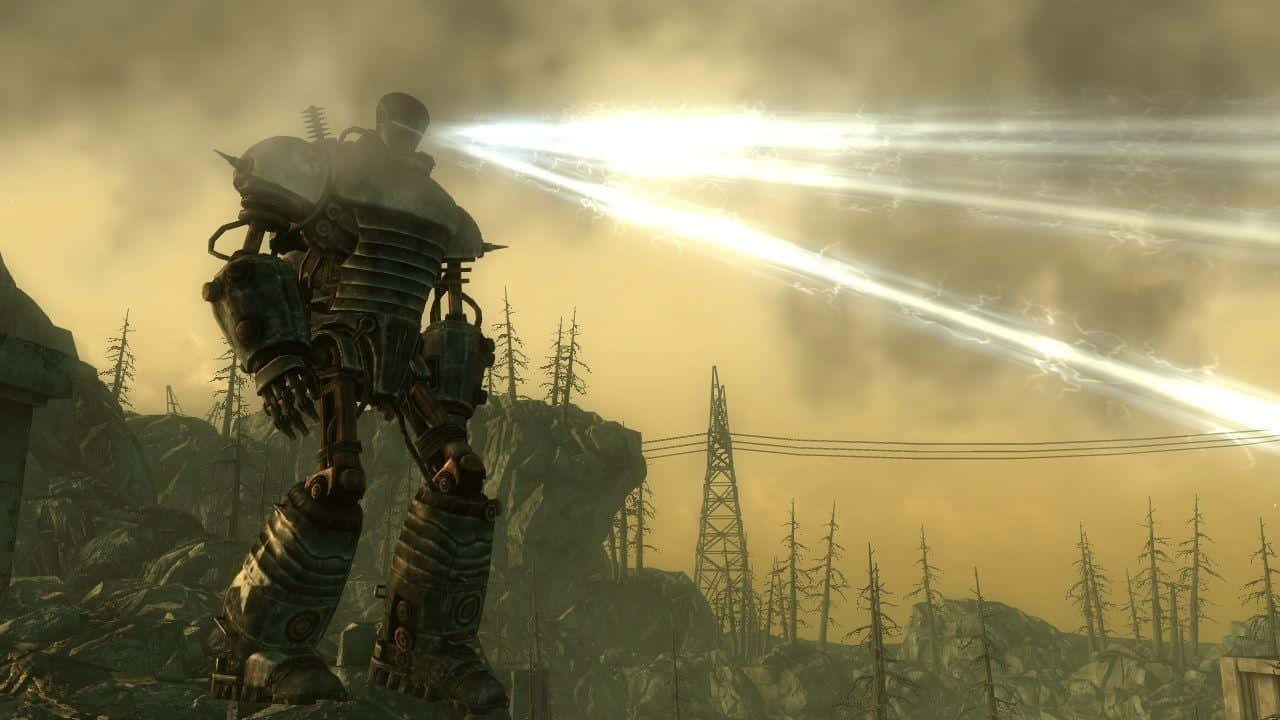 Liberty Prime 桌布 壁紙 — 一件高聳的裝甲動力裝甲服在一個荒涼、煙霧瀰漫的廢土上發射明亮的能量光束，周圍有骷髏般的樹木和毀壞的塔樓。
