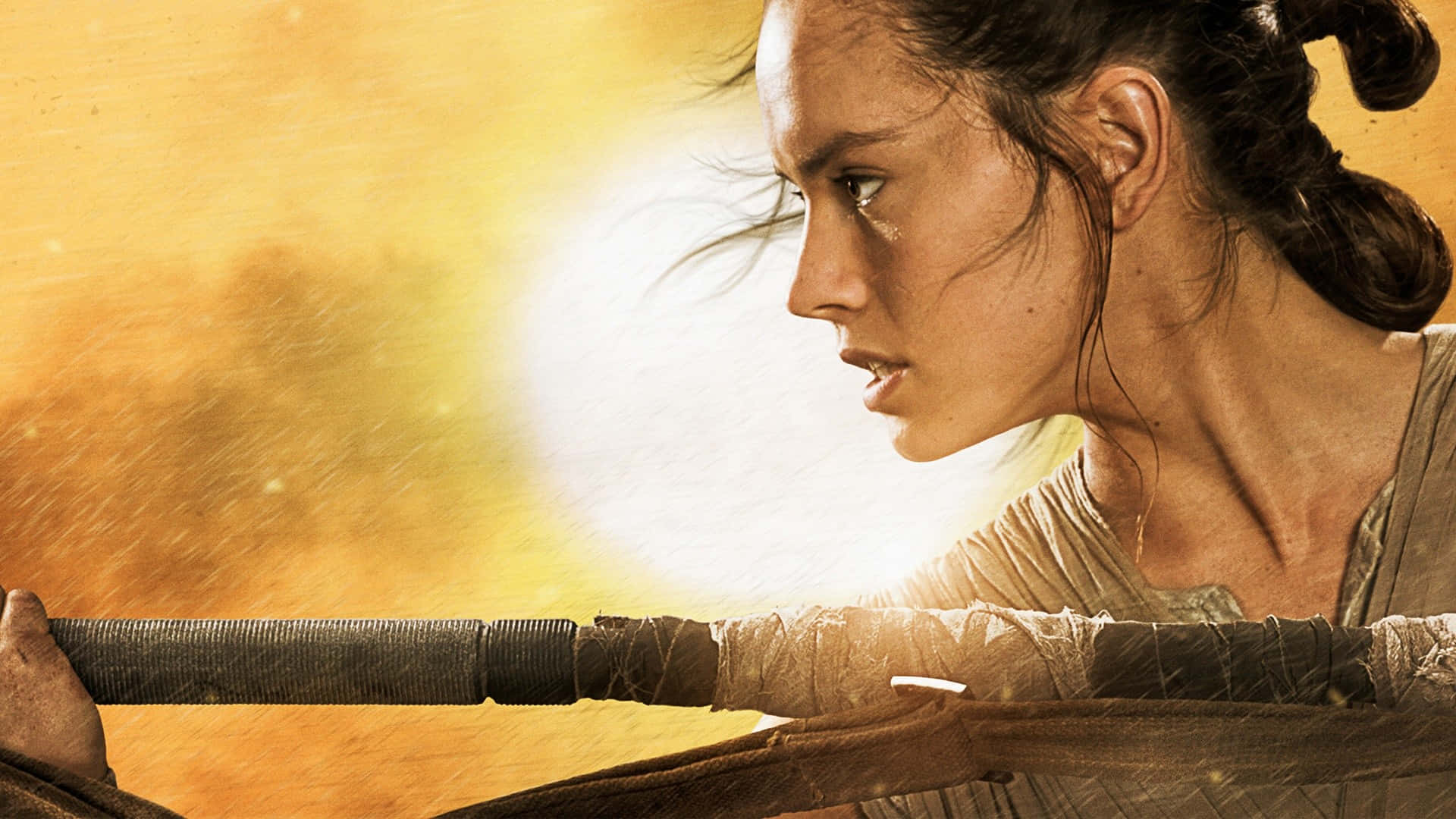 Jakku 桌布 壁紙 — 一位堅定的女戰士在金色塵土飛揚的背景前，專注地握緊長棍。