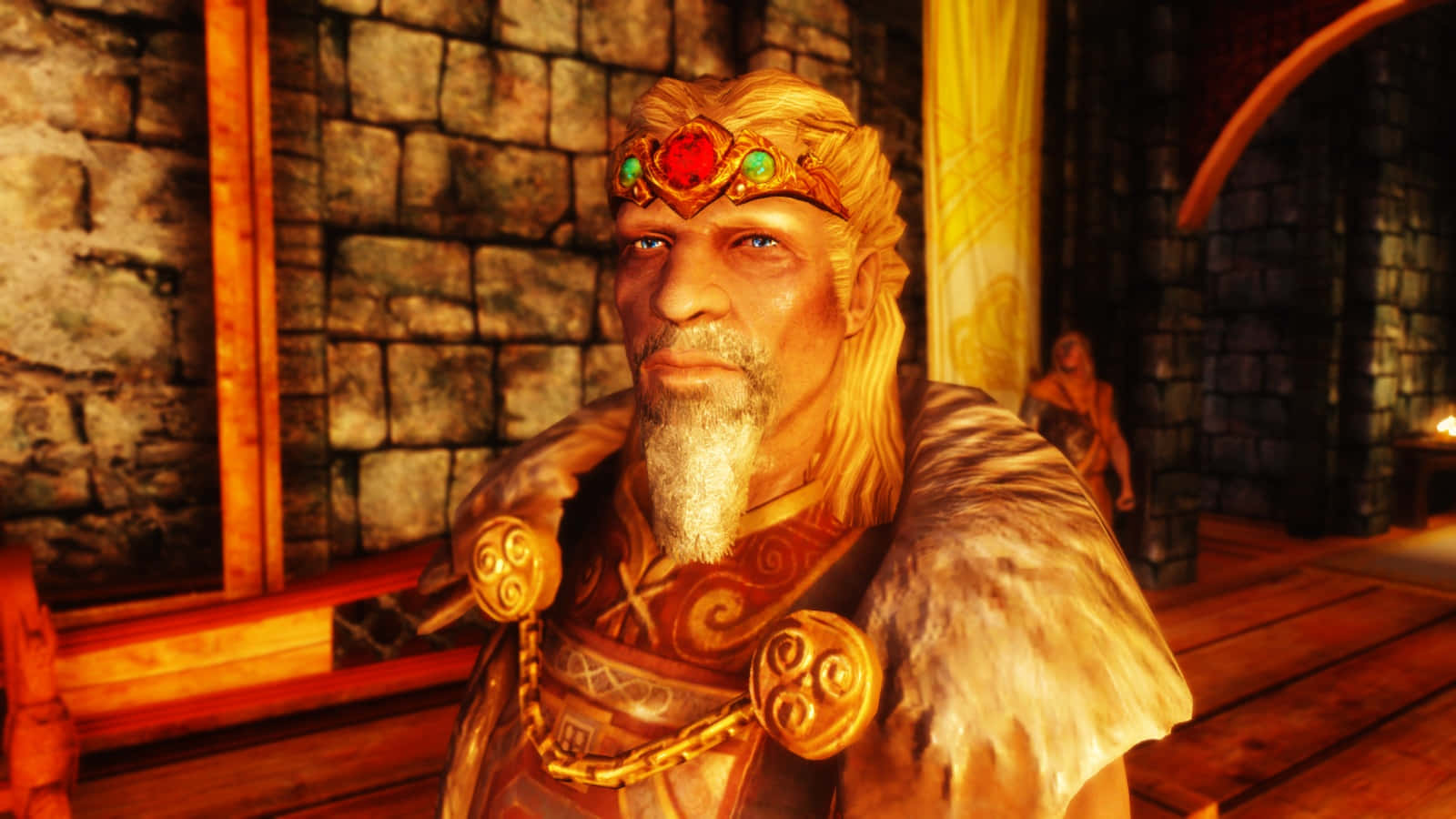 Jarl Balgruuf 桌布 壁紙 — 一位威嚴的奇幻國王，戴著鑲有寶石的王冠，穿著毛皮襯裡的盔甲，坐在溫暖燈光照亮的石廳中。
