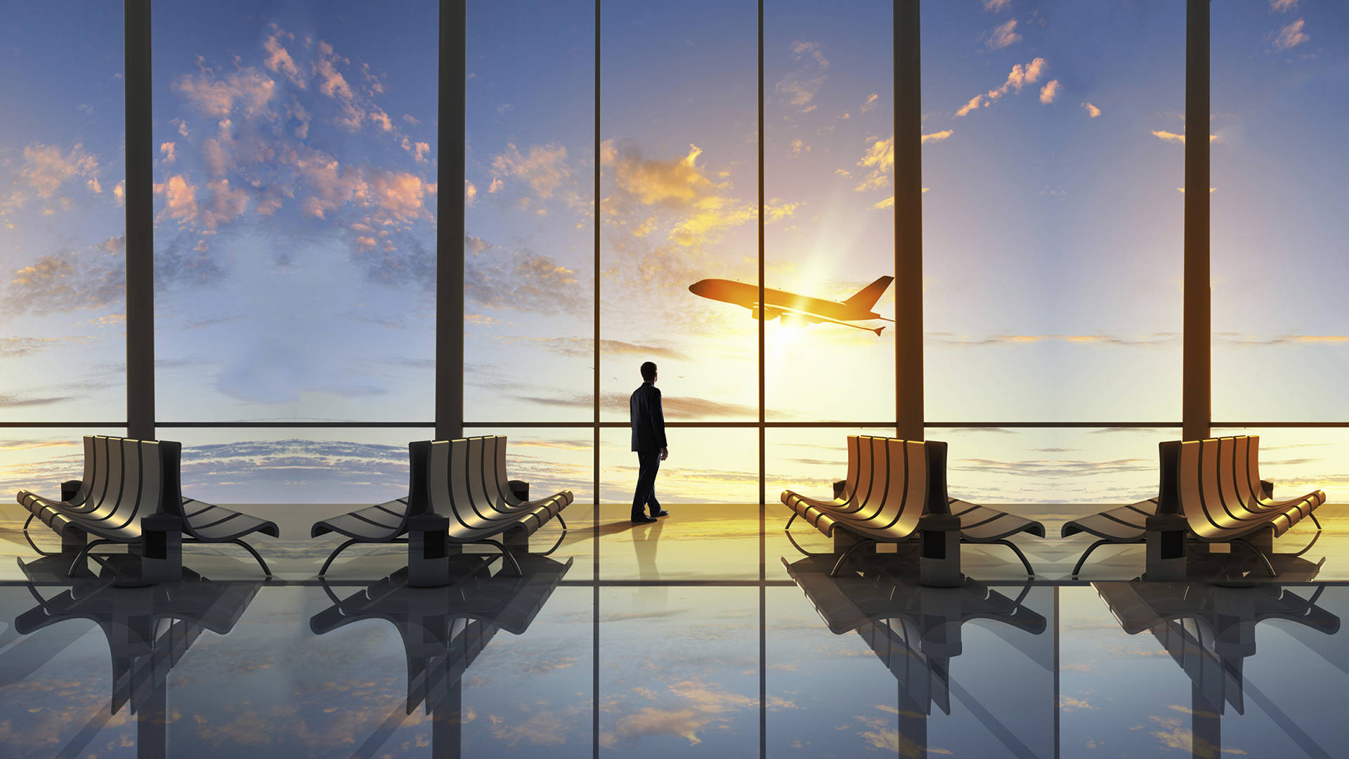 Airport 桌布 壁紙 — 一位孤獨的旅客站在機場客運大樓，透過落地窗觀看飛機在日落時分翱翔。