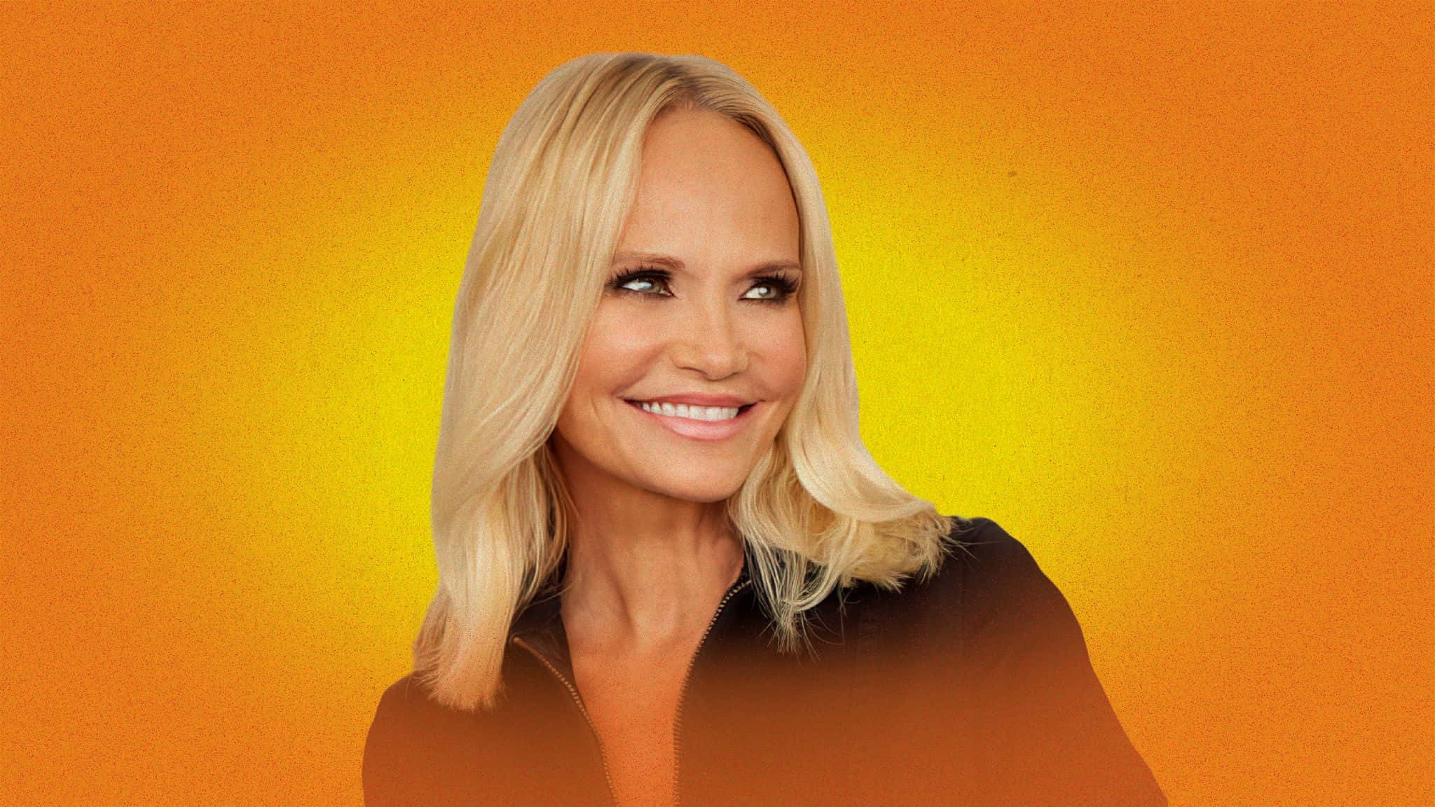 kristin chenoweth 桌布 壁紙 — 一位微笑的金髮女性身穿黑色上衣，背景是充滿活力的橙黃漸變色。