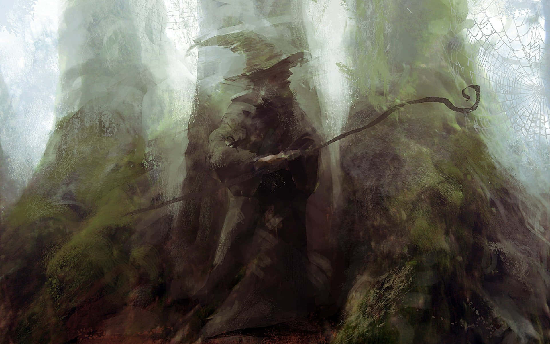 Wizardry 桌布 壁紙 — 一位戴著兜帽的巫師手持彎曲法杖，站在迷霧森林中，周圍環繞著古老的苔蘚樹木和蜘蛛網。