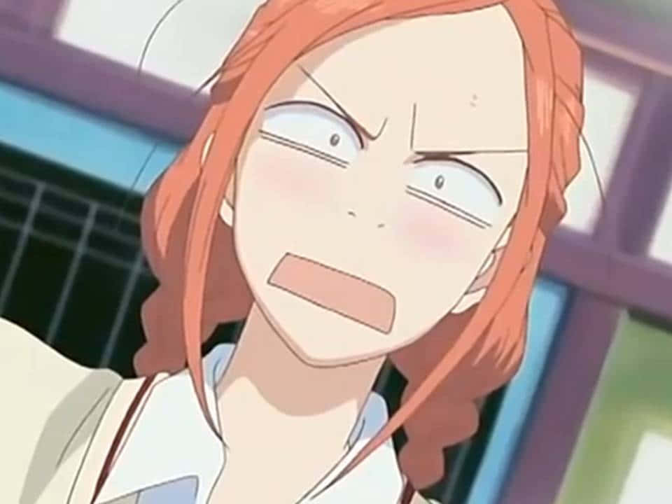 搞笑動漫GIF 桌布 壁紙 — 一位擁有橙色頭髮和憤怒眼神的動漫女孩，帶著兇猛的表情大喊。