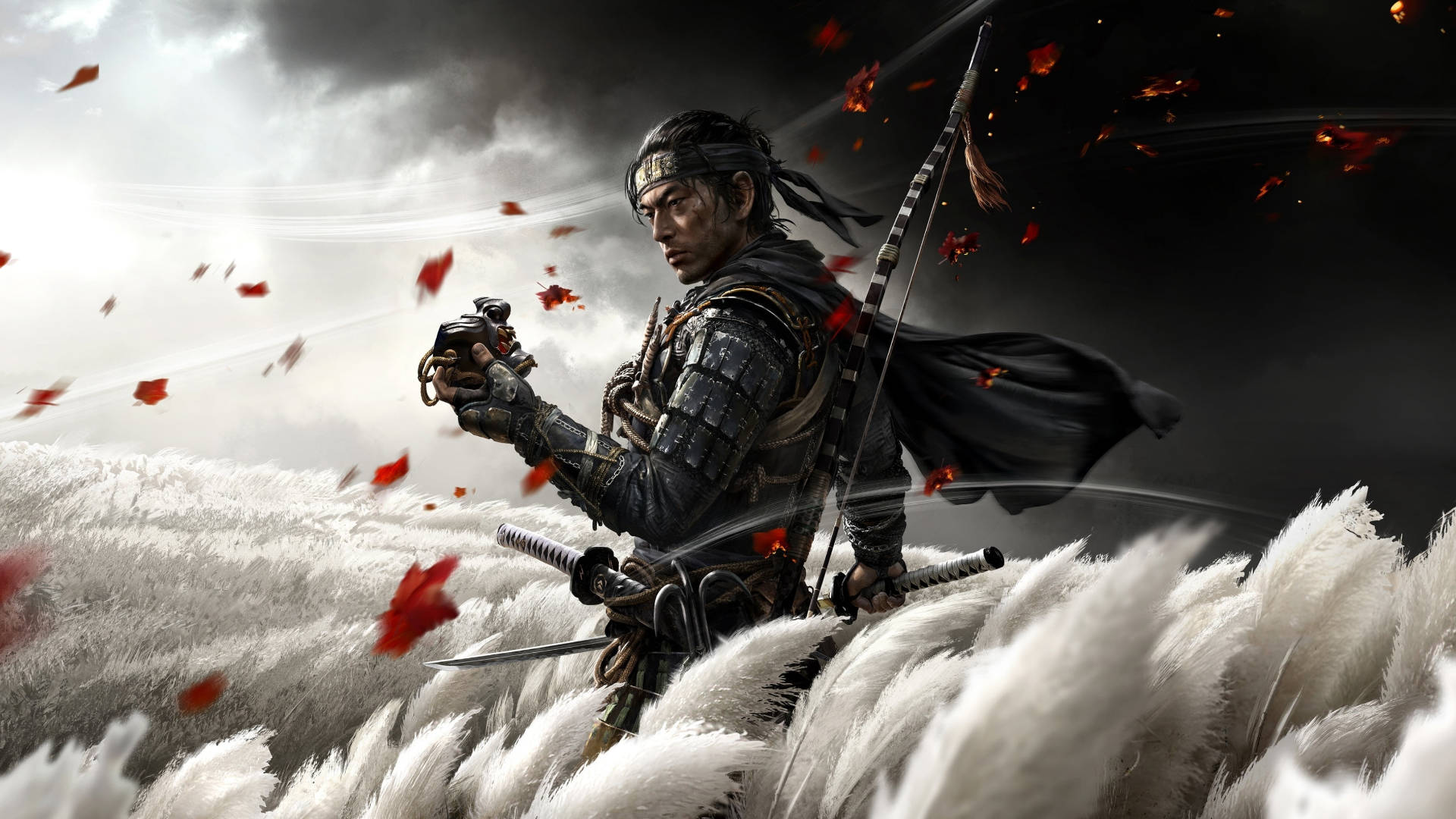 對馬戰鬼 桌布 壁紙 — 一位武士戰士站在白雪覆蓋的山峰上，手持武器，紅色的楓葉在暴風雨的天空中旋轉。