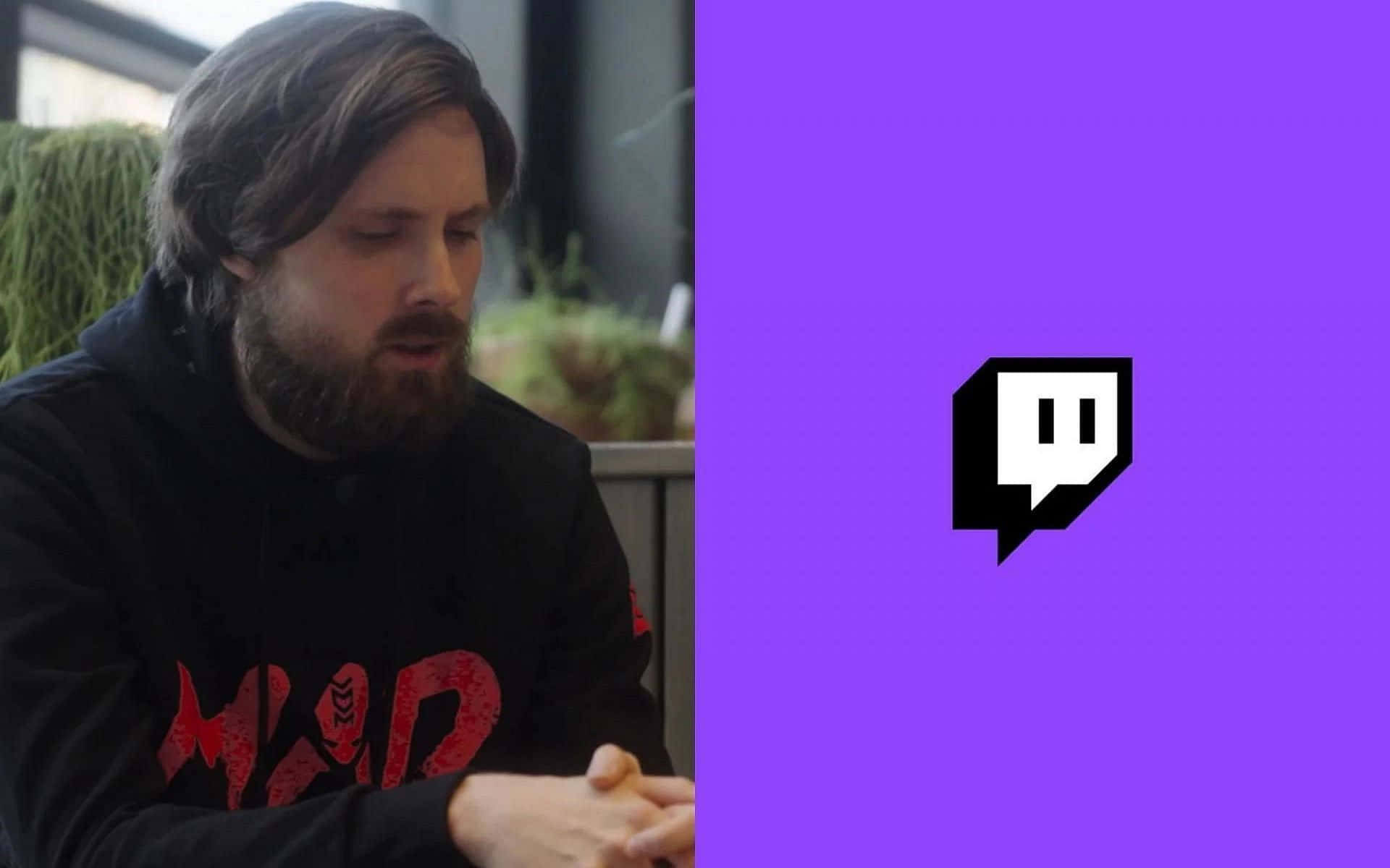 Minecraft Twitch Streamers 桌布 壁紙 — 一位留鬍鬚的男子坐在室內，旁邊是帶有Twitch標誌的鮮豔紫色背景。