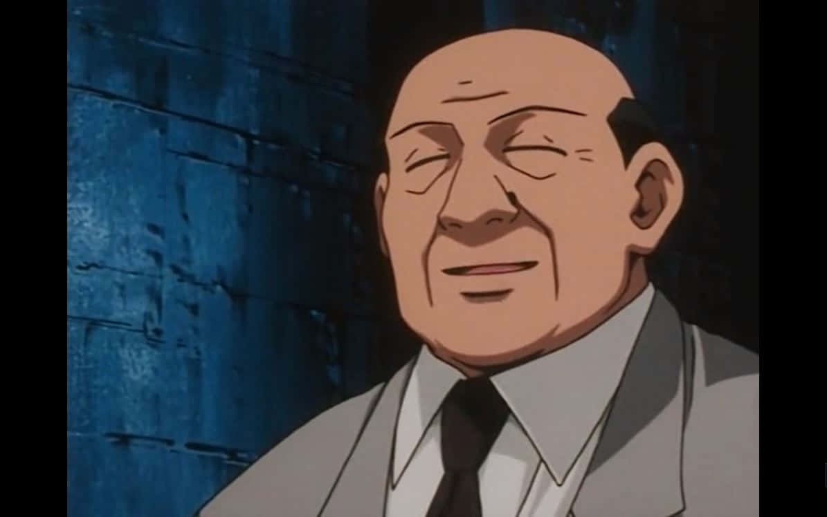 Hunter X Hunter Zebro 桌布 壁紙 — 一位穿著西裝的動畫男子，對著有紋理的藍色牆壁溫暖地微笑。